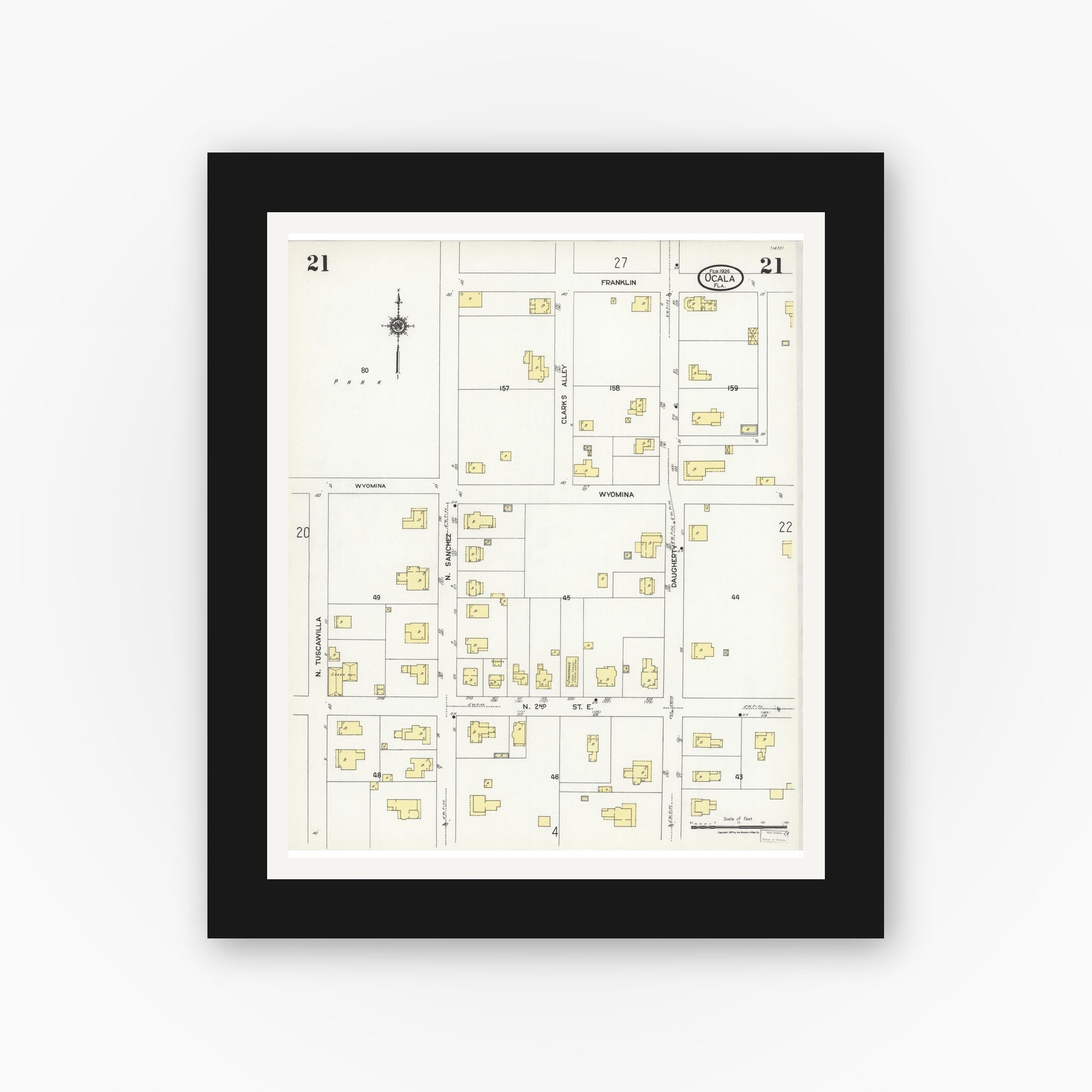 Old map wall art mockup — black gallery frame with white mat — Sanborn Fire Insurance Map from Ocala, Marion County, Florida (1924), Sheet #0021