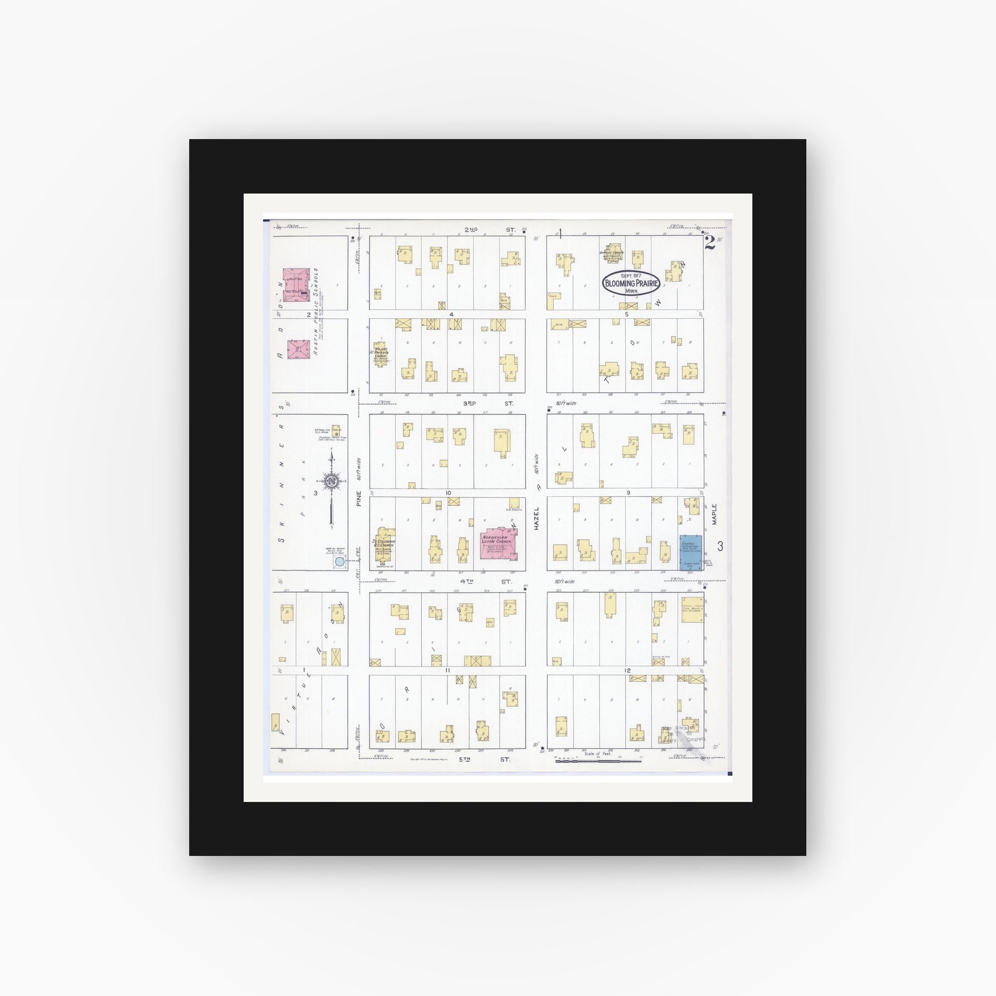 Old map wall art mockup — black gallery frame with white mat — Sanborn Fire Insurance Map from Blooming Prairie, Steele County, Minnesota (1917), Sheet #0002