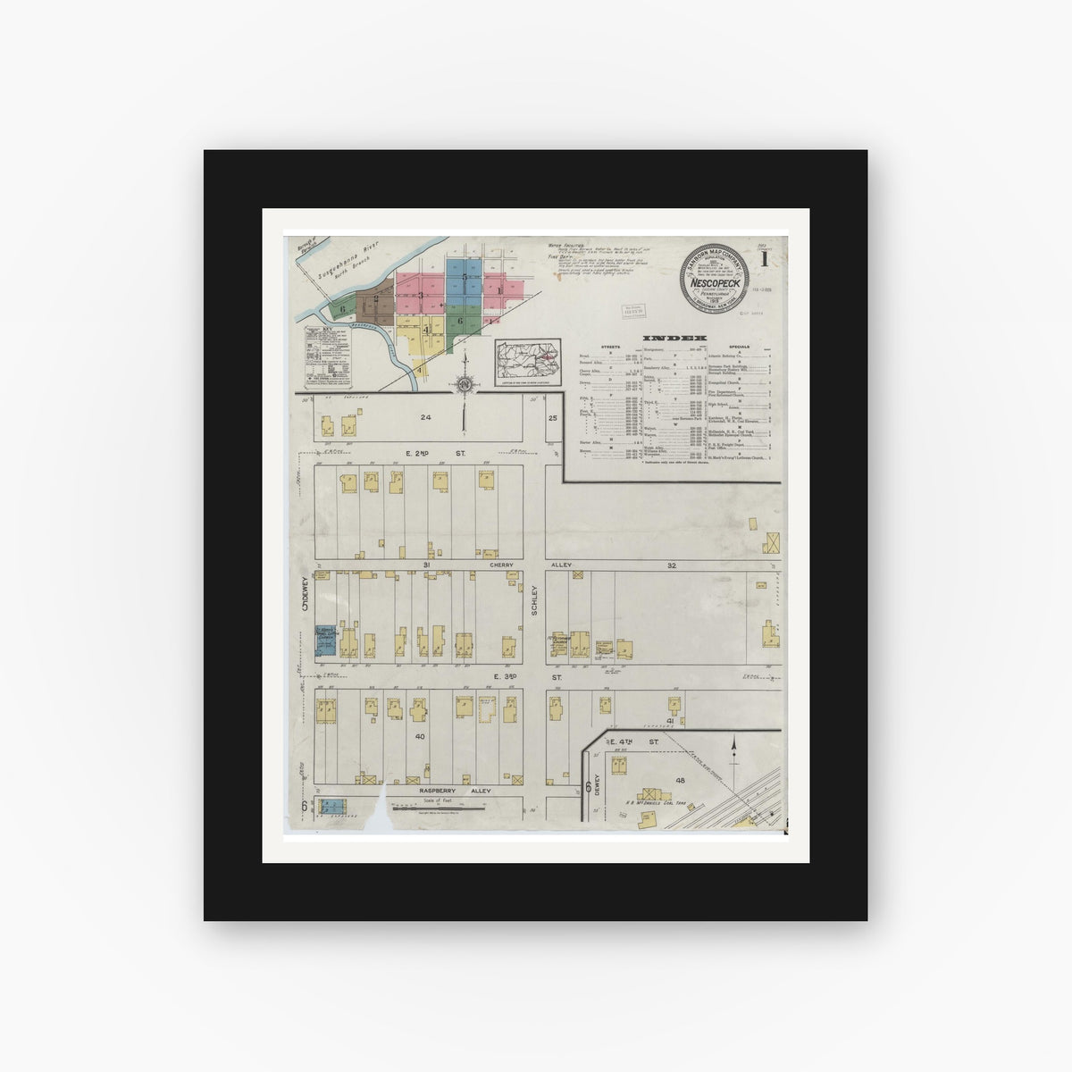 Old map wall art mockup — black gallery frame with white mat — Sanborn Fire Insurance Map from Nescopeck, Luzerne County, Pennsylvania (1919), Sheet #0001