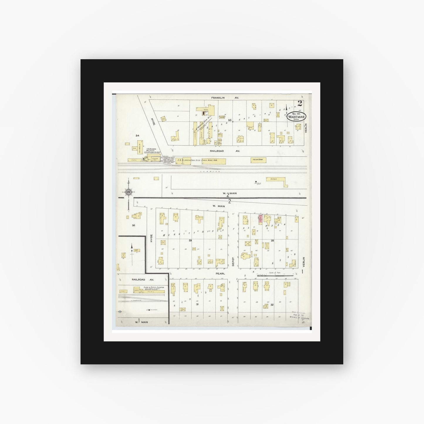 Old map wall art mockup — black gallery frame with white mat — Sanborn Fire Insurance Map from Wakeman, Huron County, Ohio (1911), Sheet #0002