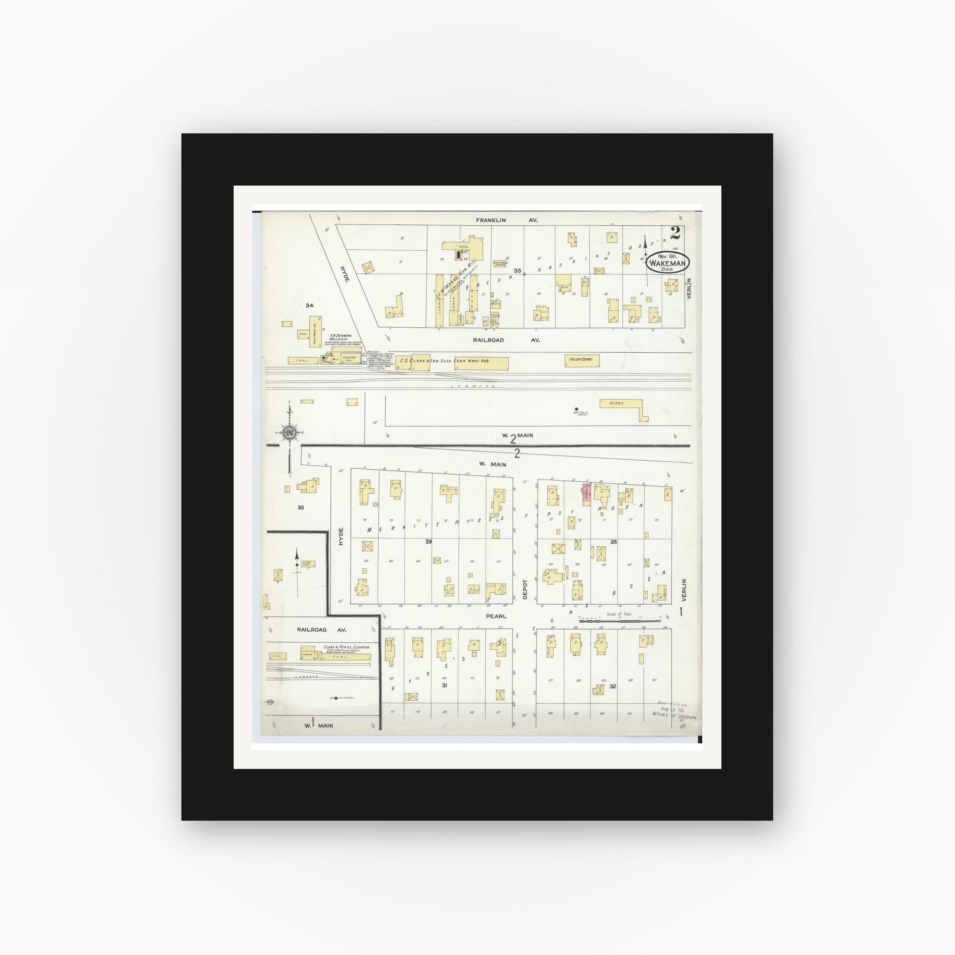 Old map wall art mockup — black gallery frame with white mat — Sanborn Fire Insurance Map from Wakeman, Huron County, Ohio (1911), Sheet #0002
