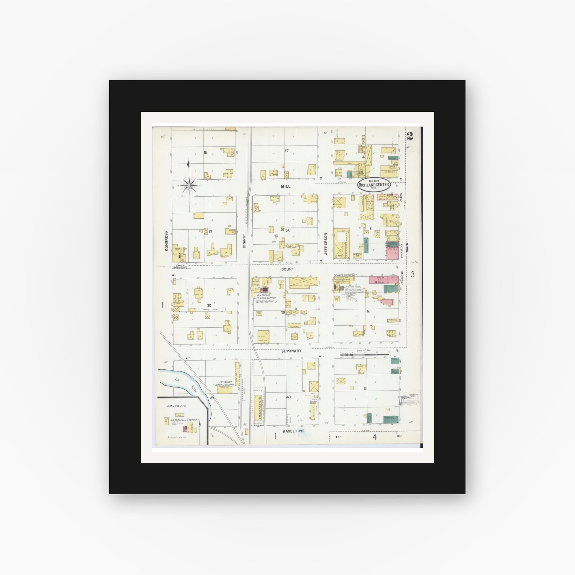 Old map wall art mockup — black gallery frame with white mat — Sanborn Fire Insurance Map from Richland Center, Richland County, Wisconsin (1899), Sheet #0002