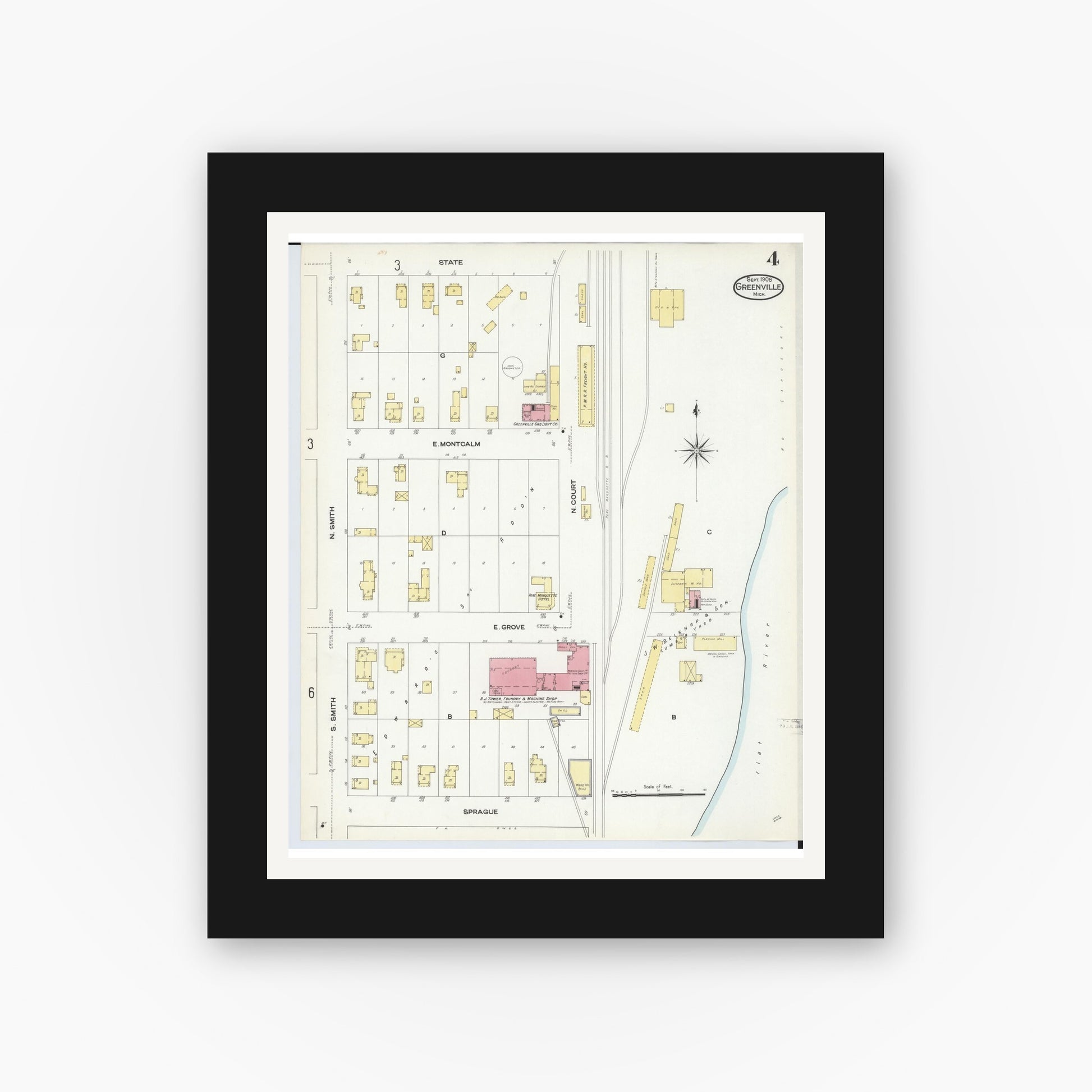 Old map wall art mockup — black gallery frame with white mat — Sanborn Fire Insurance Map from Greenville, Montcalm County, Michigan (1908), Sheet #0004