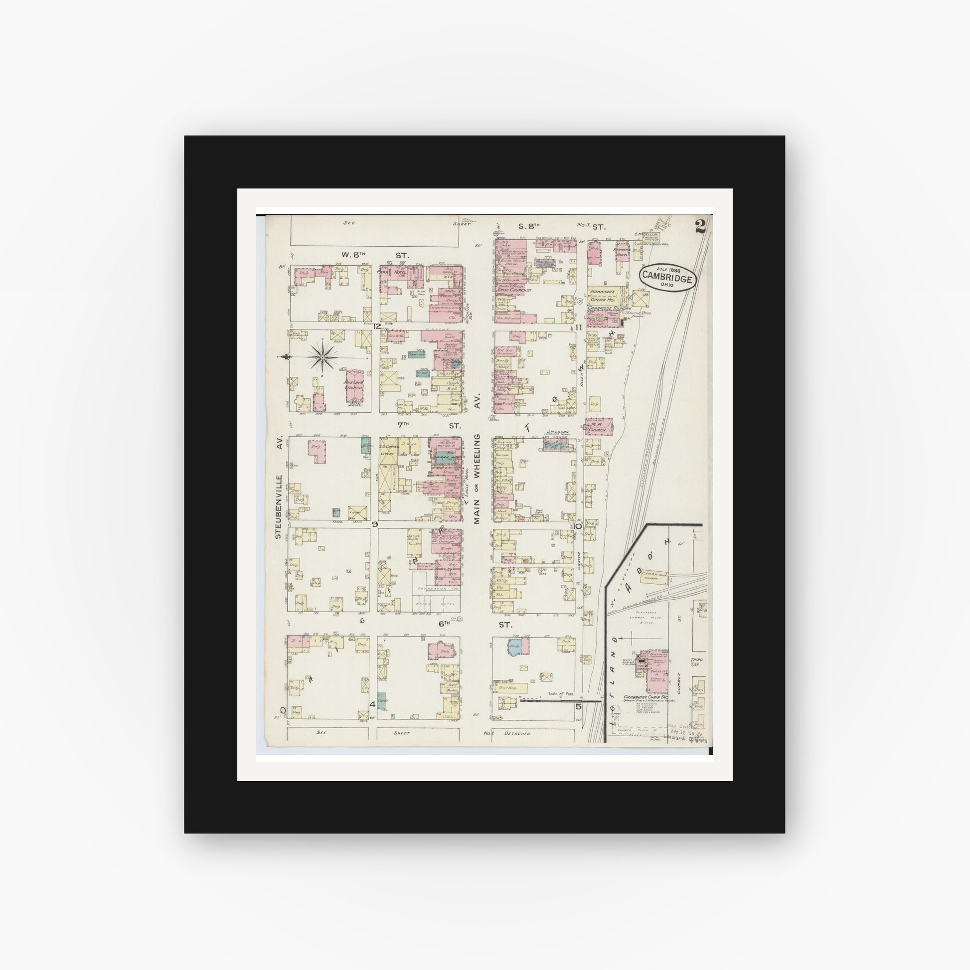 Old map wall art mockup — black gallery frame with white mat — Sanborn Fire Insurance Map from Cambridge, Guernsey County, Ohio (1886), Sheet #0002