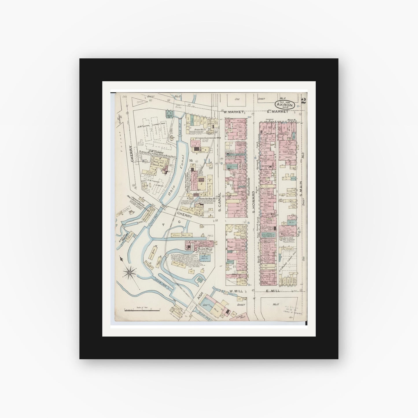 Old map wall art mockup — black gallery frame with white mat — Sanborn Fire Insurance Map from Akron, Summit County, Ohio (1886), Sheet #0002