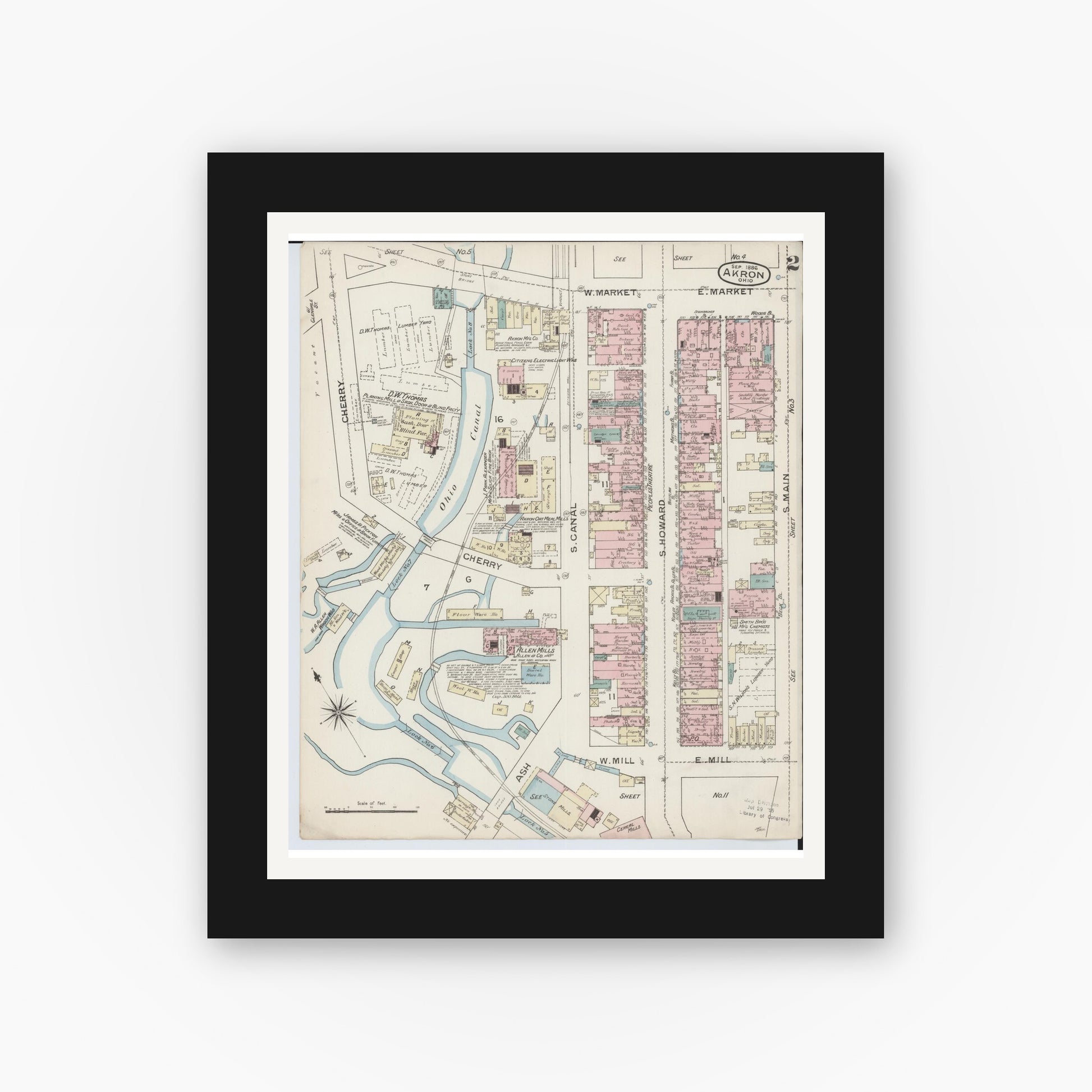 Old map wall art mockup — black gallery frame with white mat — Sanborn Fire Insurance Map from Akron, Summit County, Ohio (1886), Sheet #0002