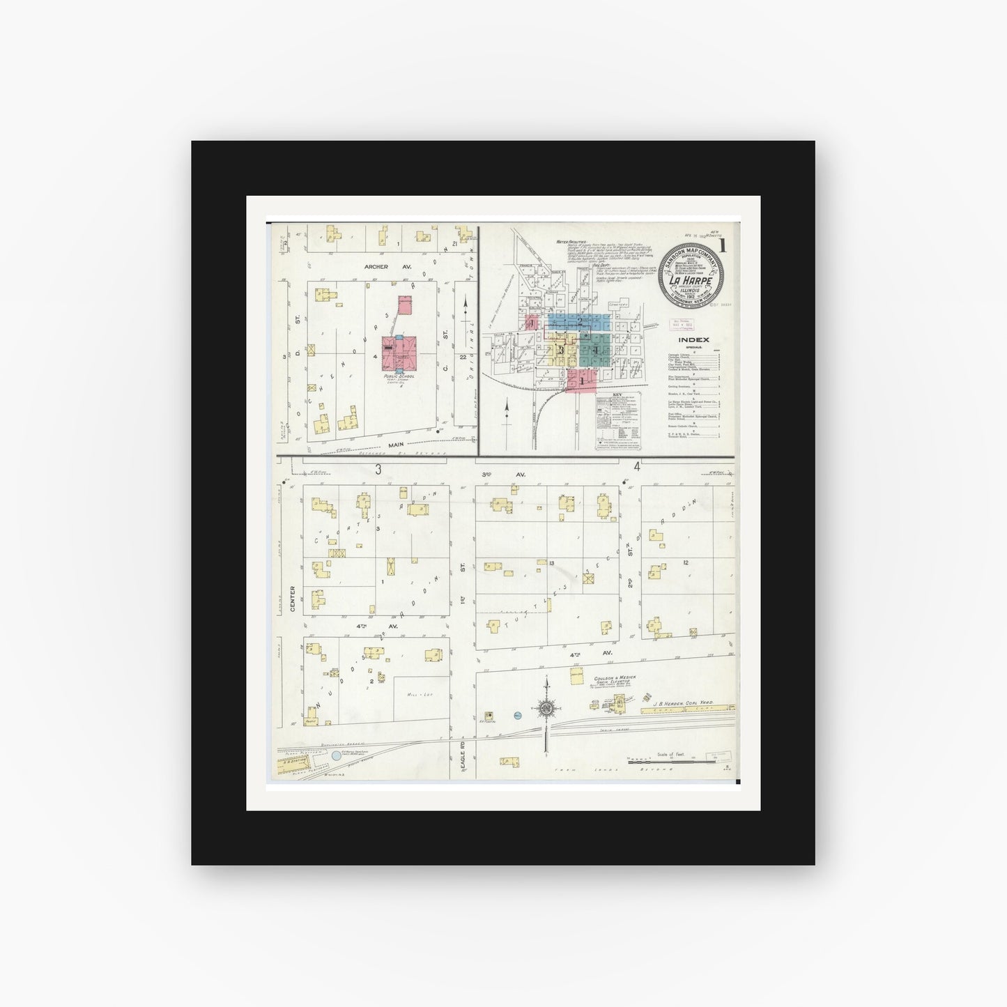 Old map wall art mockup — black gallery frame with white mat — Sanborn Fire Insurance Map from La Harpe, Hancock County, Illinois (1912), Sheet #0001