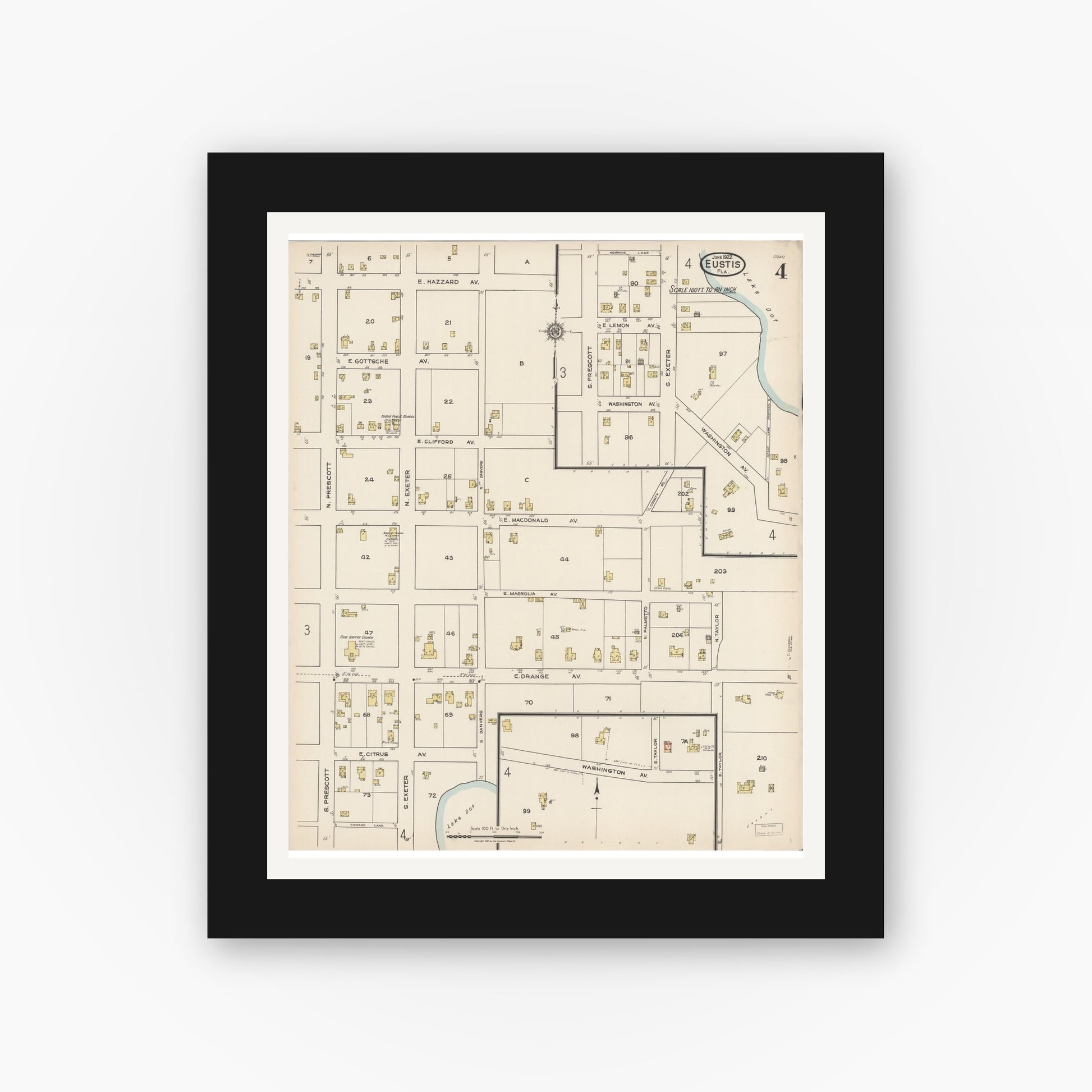 Old map wall art mockup — black gallery frame with white mat — Sanborn Fire Insurance Map from Eustis, Lake County, Florida (1922), Sheet #0004