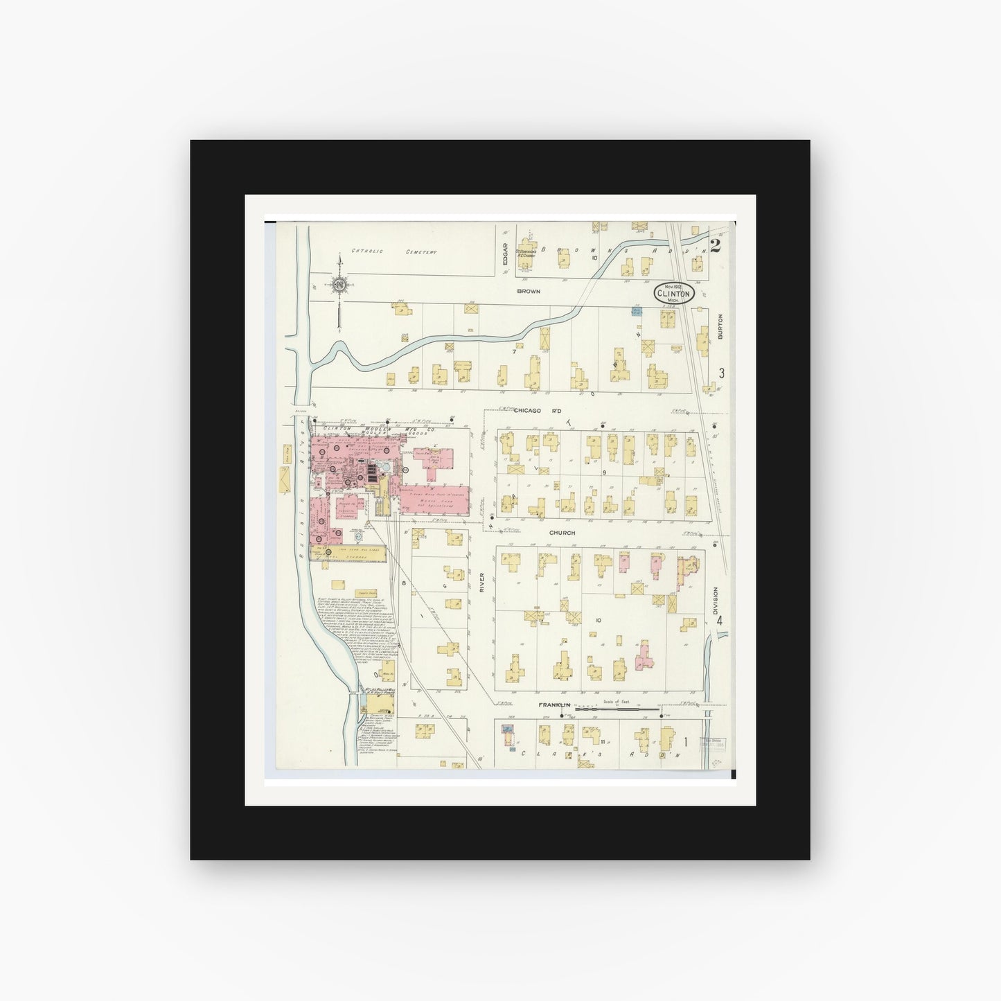 Old map wall art mockup — black gallery frame with white mat — Sanborn Fire Insurance Map from Clinton, Lenawee County, Michigan (1912), Sheet #0002