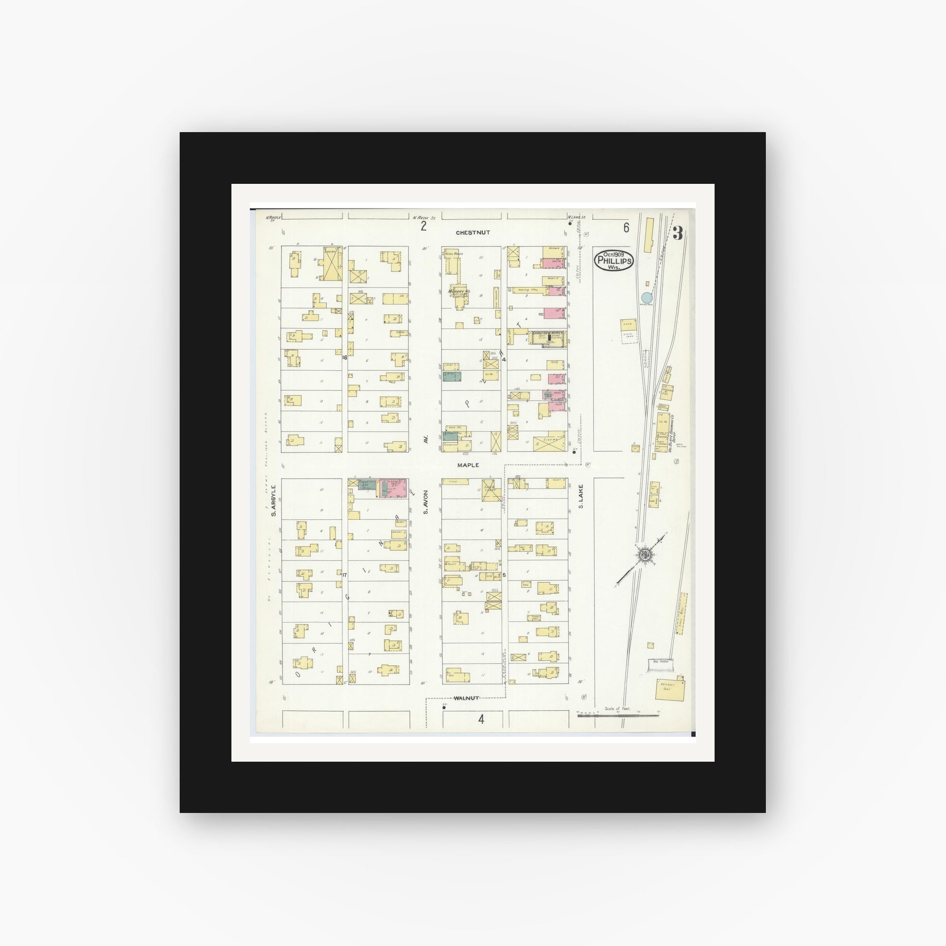 Old map wall art mockup — black gallery frame with white mat — Sanborn Fire Insurance Map from Phillips, Price County, Wisconsin (1909), Sheet #0003