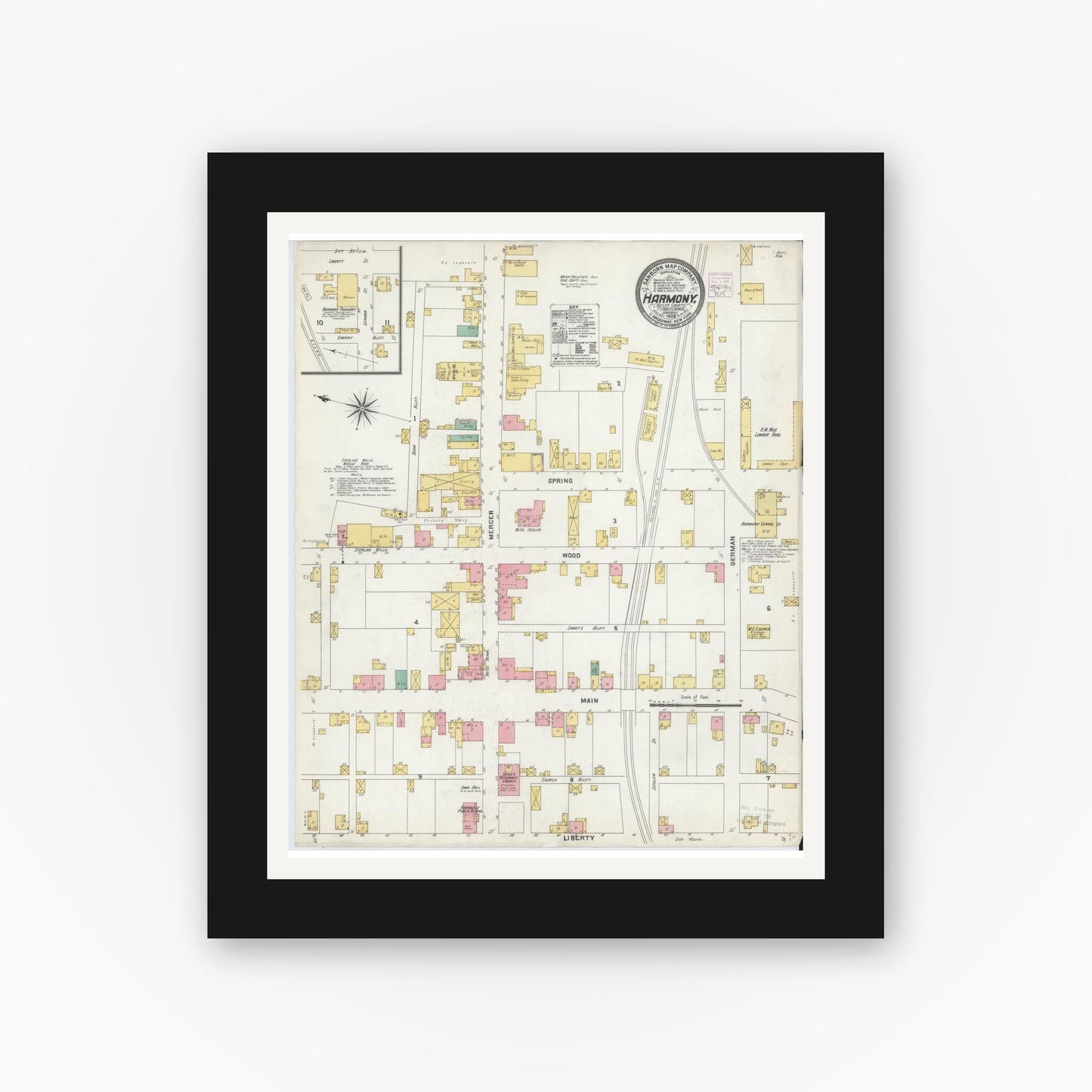Old map wall art mockup — black gallery frame with white mat — Sanborn Fire Insurance Map from Harmony, Butler County, Pennsylvania (1906), Sheet #0001
