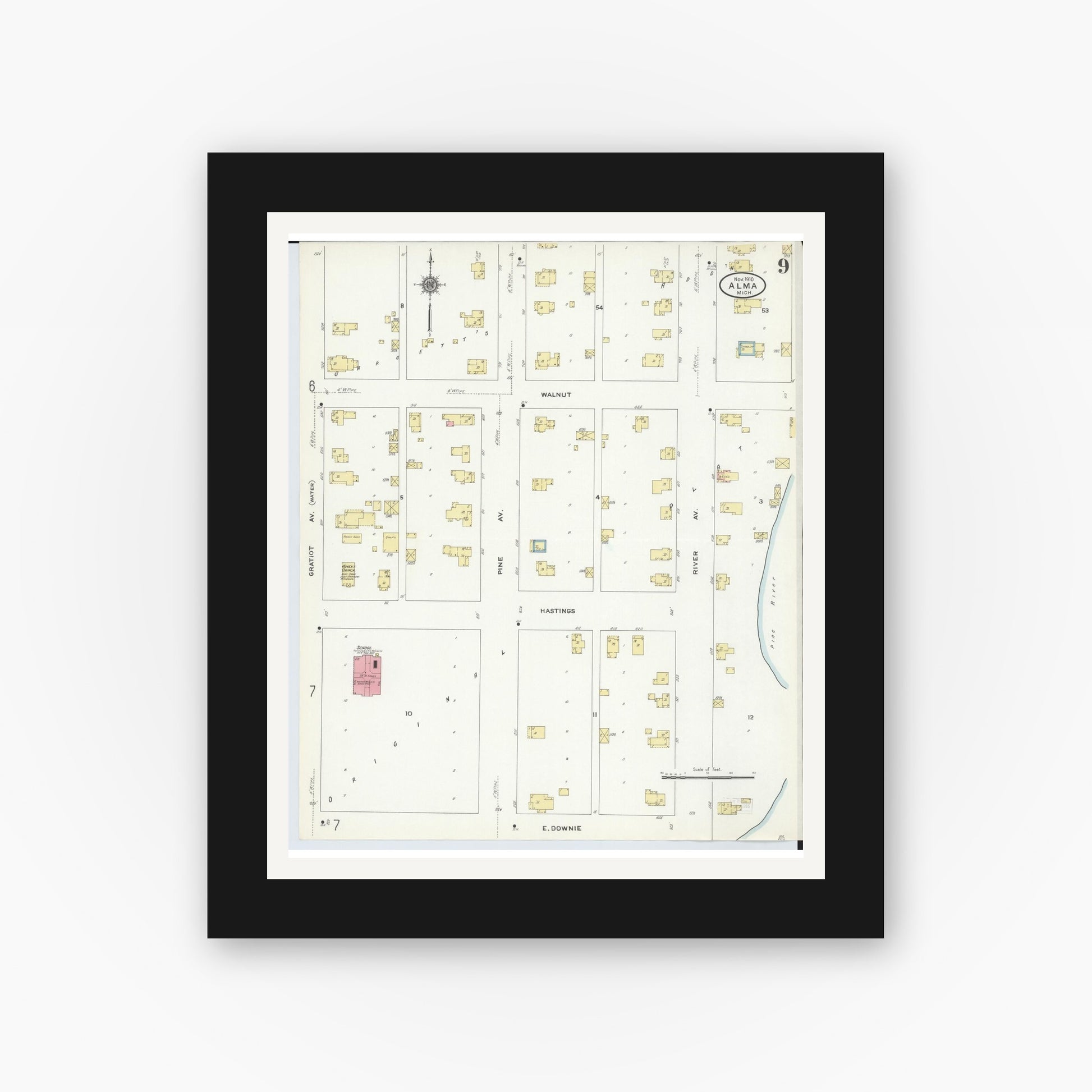 Old map wall art mockup — black gallery frame with white mat — Sanborn Fire Insurance Map from Alma, Gratiot County, Michigan (1910), Sheet #0009