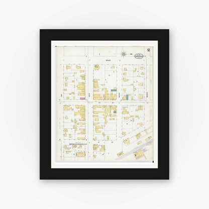 Old map wall art mockup — black gallery frame with white mat — Sanborn Fire Insurance Map from Harrison, Clare County, Michigan (1900), Sheet #0002