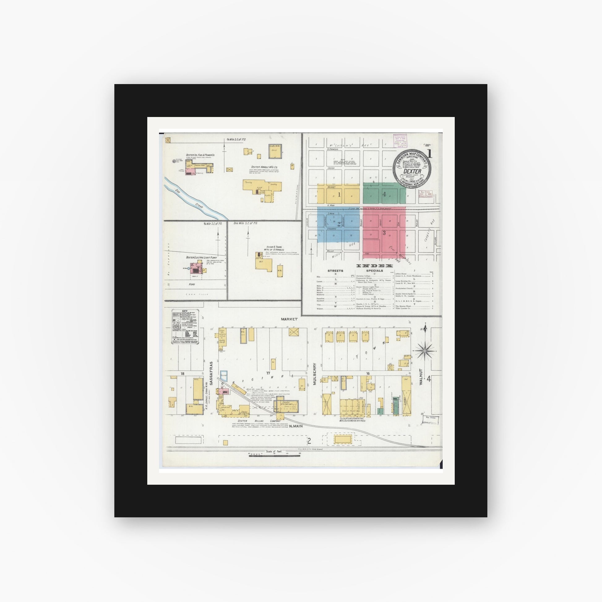 Old map wall art mockup — black gallery frame with white mat — Sanborn Fire Insurance Map from Dexter, Stoddard County, Missouri (1906) - Complete Map Set