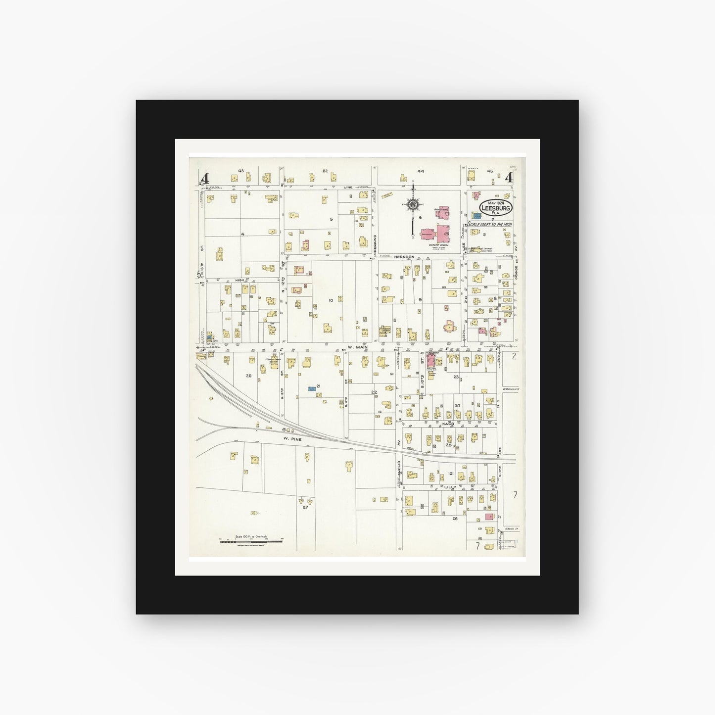 Old map wall art mockup — black gallery frame with white mat — Sanborn Fire Insurance Map from Leesburg, Lake County, Florida (1924), Sheet #0004