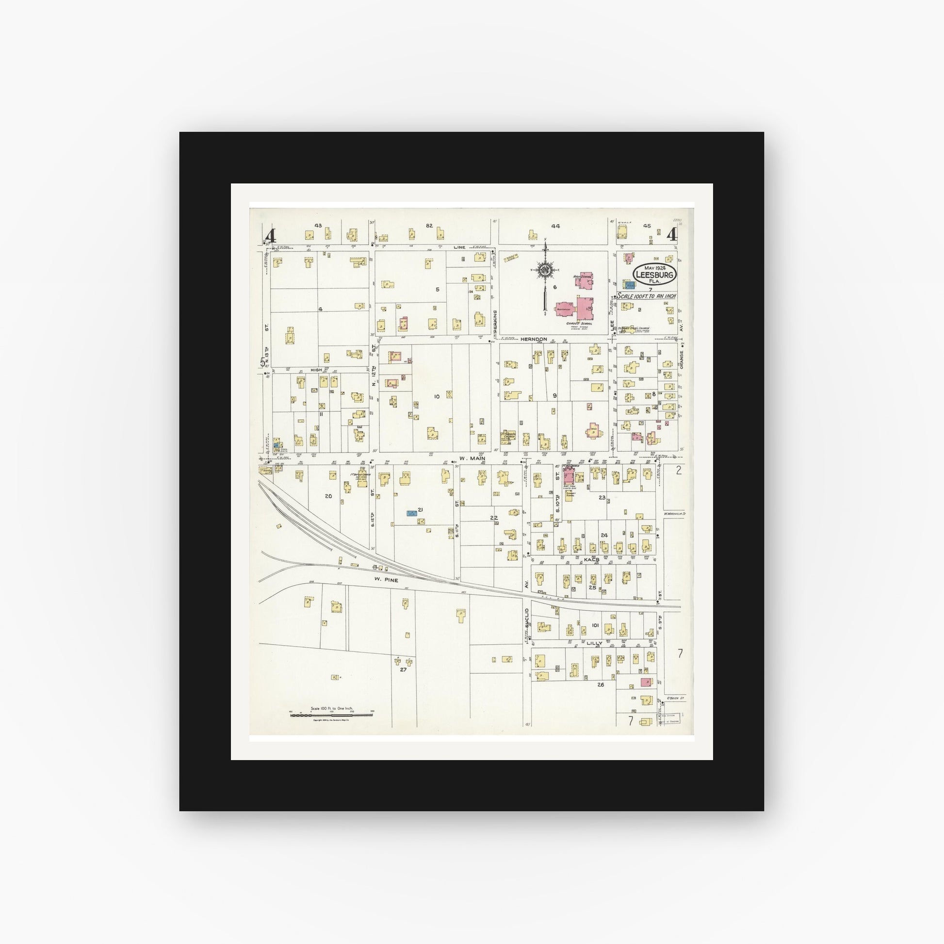 Old map wall art mockup — black gallery frame with white mat — Sanborn Fire Insurance Map from Leesburg, Lake County, Florida (1924), Sheet #0004