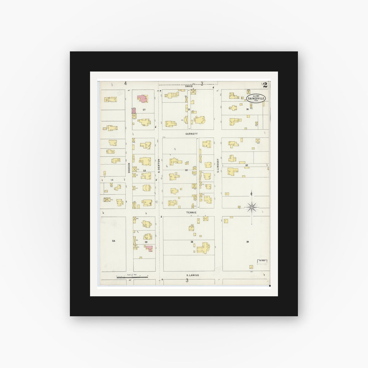 Old map wall art mockup — black gallery frame with white mat — Sanborn Fire Insurance Map from Gainesville, Cooke County, Texas (1897), Sheet #0002