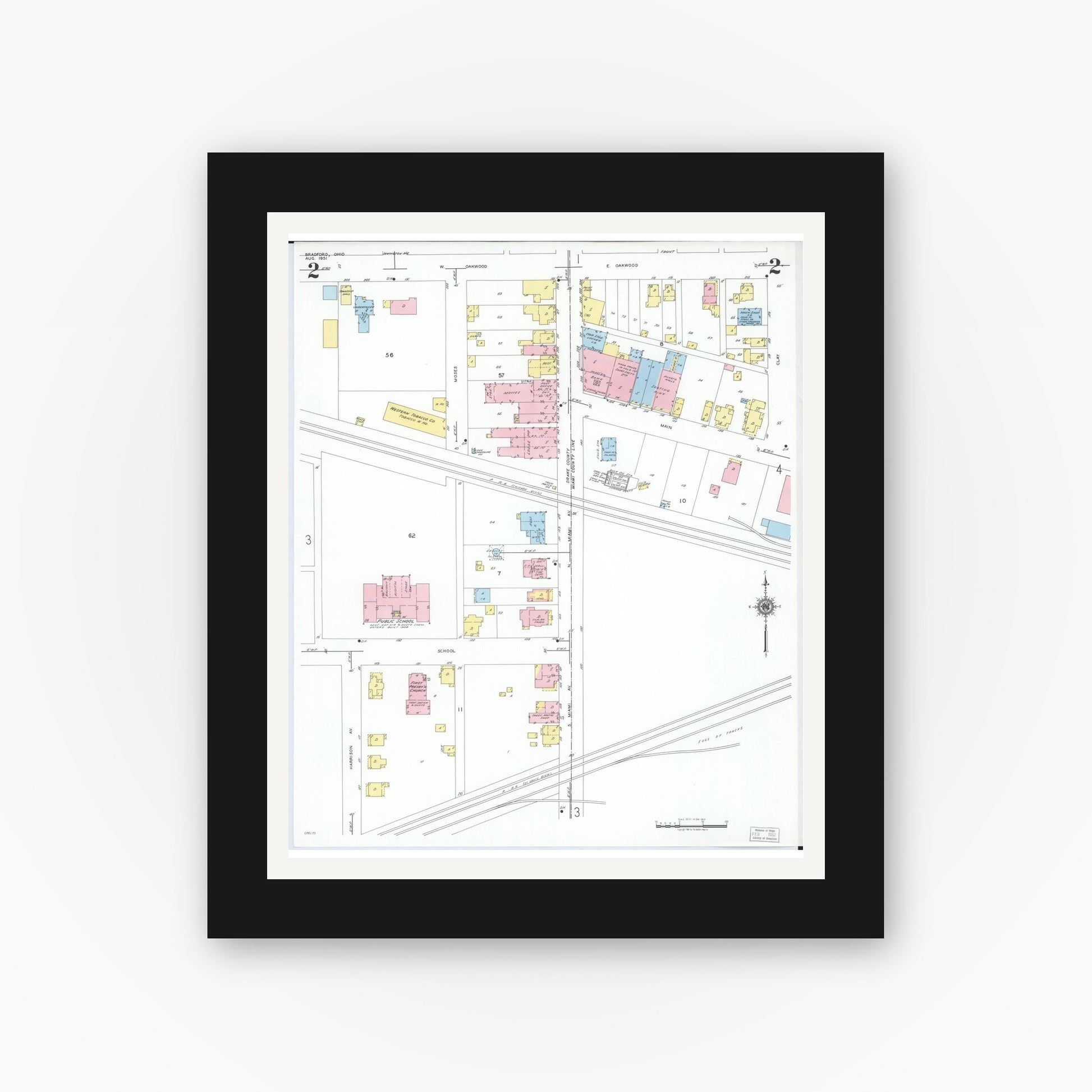 Old map wall art mockup — black gallery frame with white mat — Sanborn Fire Insurance Map from Bradford, Darke and Miami Counties, Ohio (1951), Sheet #0002