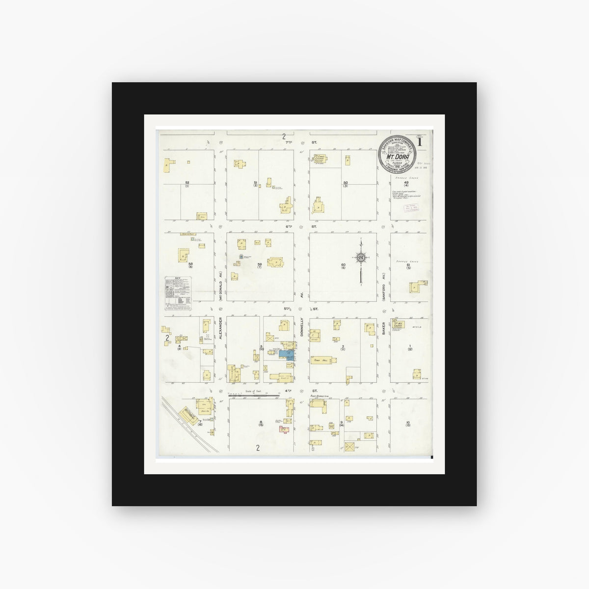 Old map wall art mockup — black gallery frame with white mat — Sanborn Fire Insurance Map from Mount Dora, Lake County, Florida (1912), Sheet #0001