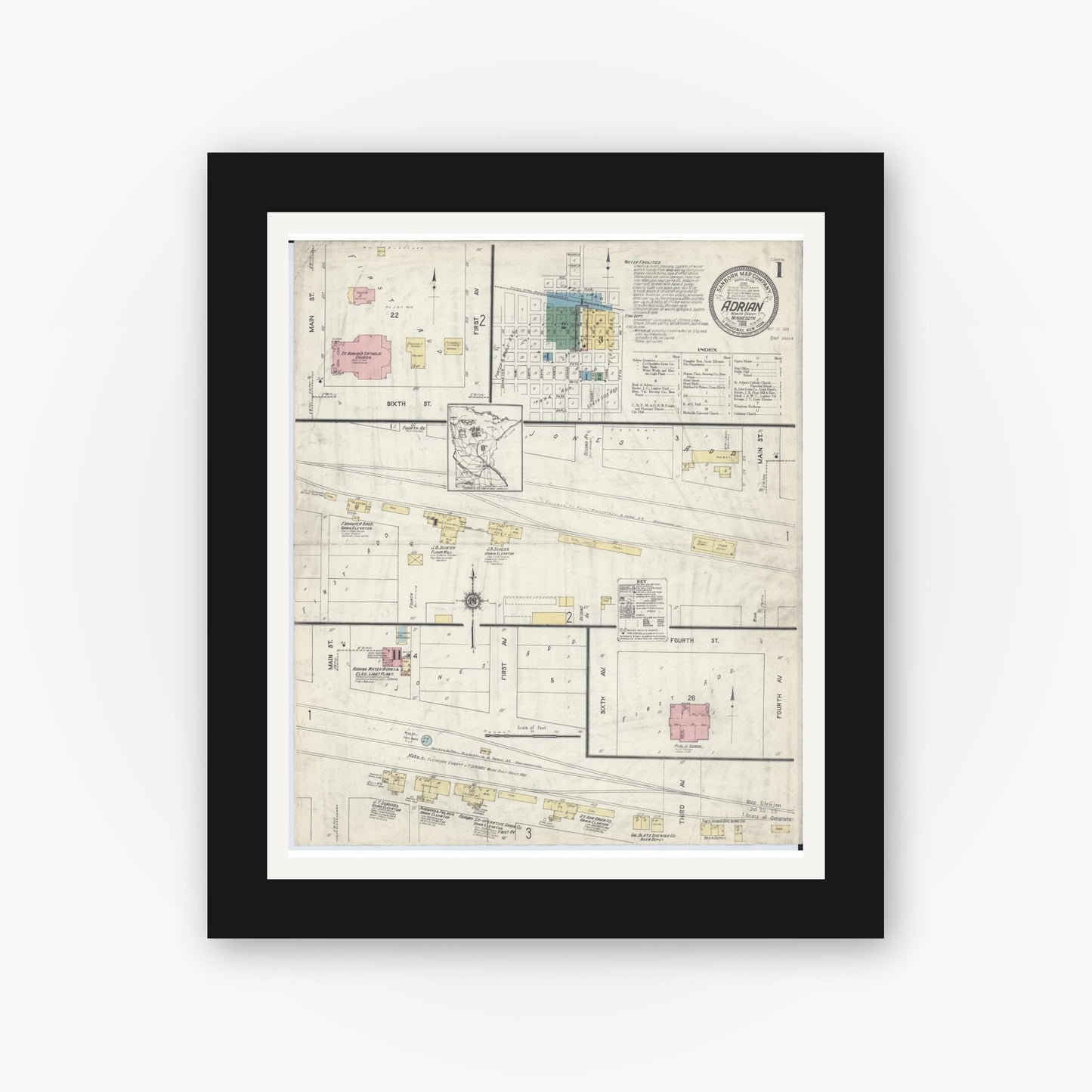Old map wall art mockup — black gallery frame with white mat — Sanborn Fire Insurance Map from Adrian, Nobles County, Minnesota (1913), Sheet #0001