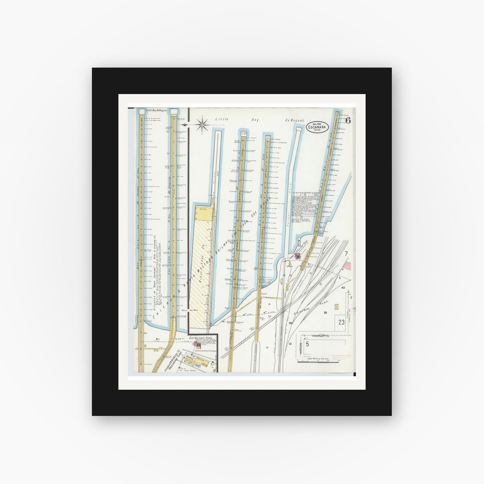 Old map wall art mockup — black gallery frame with white mat — Sanborn Fire Insurance Map from Escanaba, Delta County, Michigan (1906), Sheet #0006