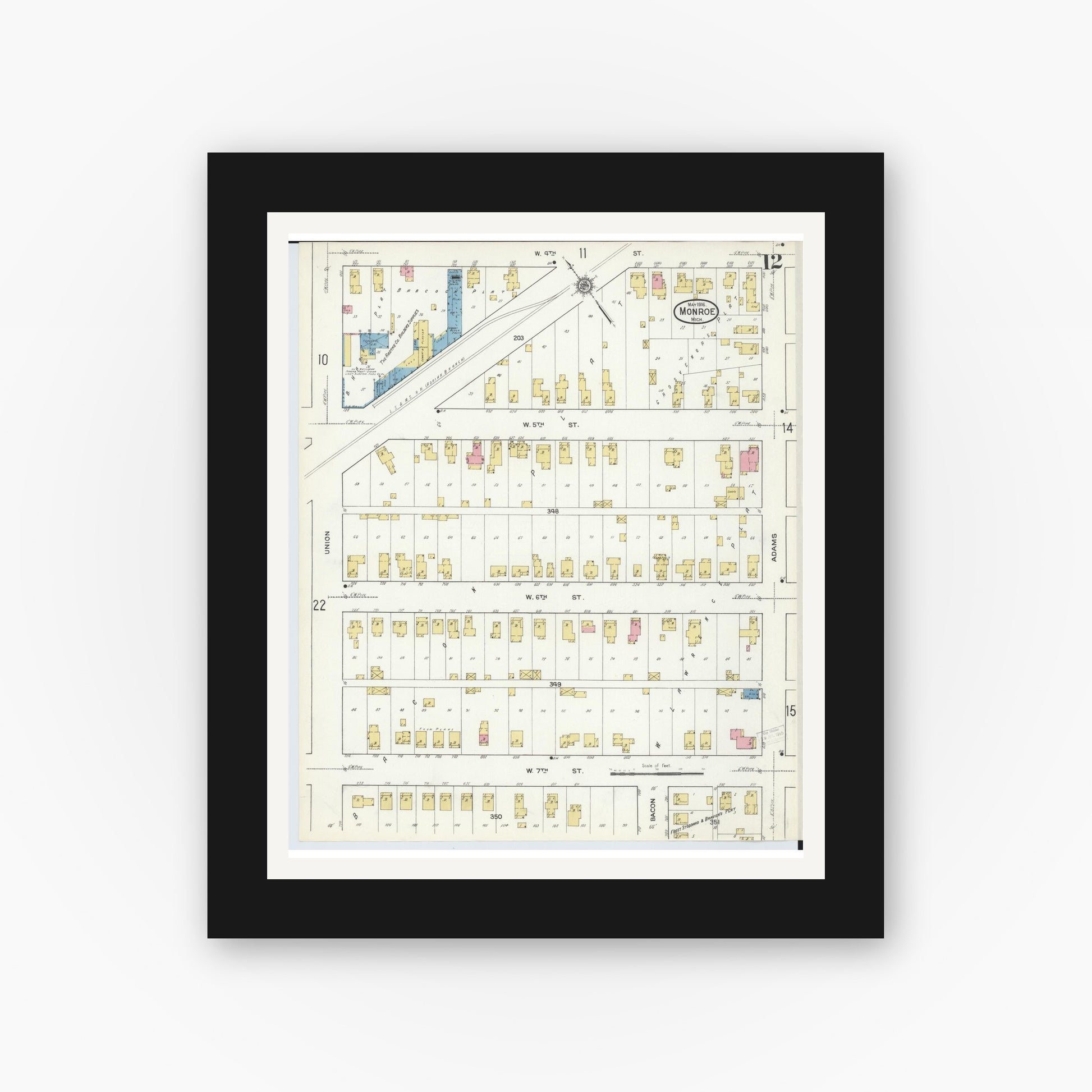 Old map wall art mockup — black gallery frame with white mat — Sanborn Fire Insurance Map from Monroe, Monroe County, Michigan (1916), Sheet #0012