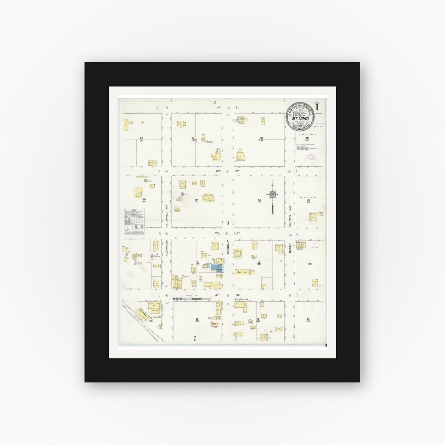 Old map wall art mockup — black gallery frame with white mat — Sanborn Fire Insurance Map from Mount Dora, Lake County, Florida (1912) - Complete Map Set
