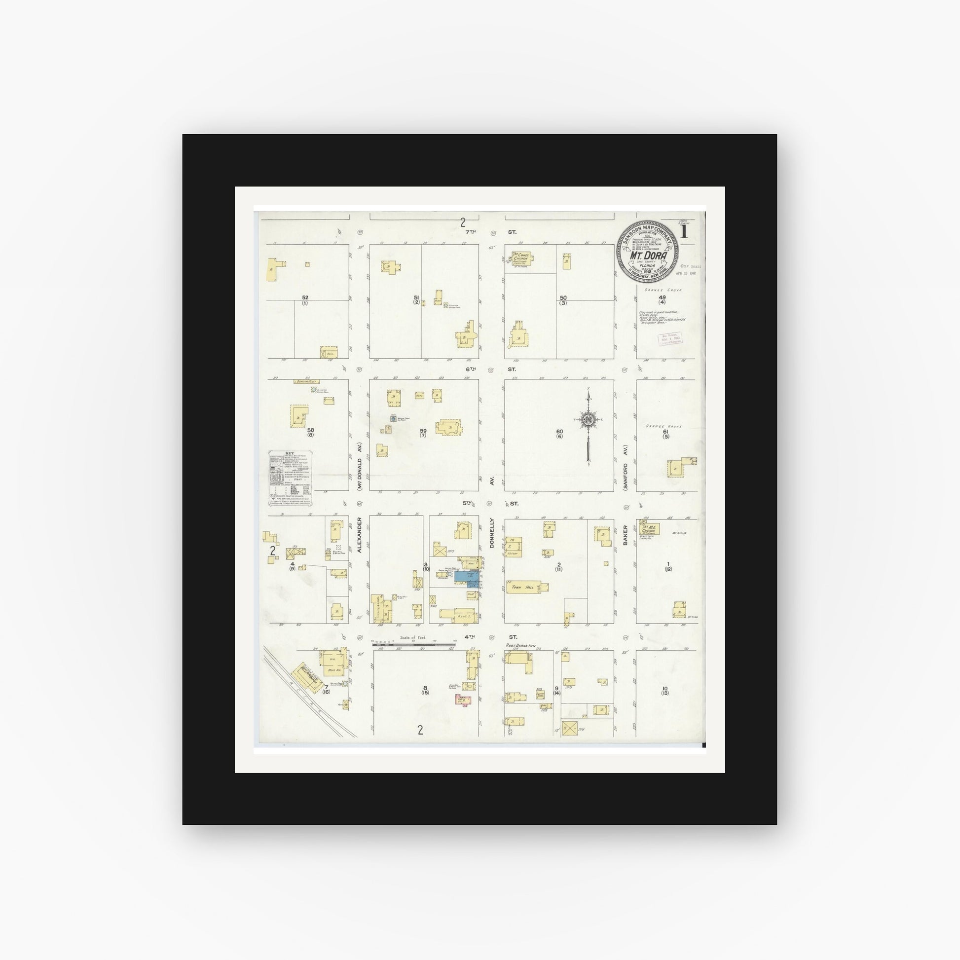 Old map wall art mockup — black gallery frame with white mat — Sanborn Fire Insurance Map from Mount Dora, Lake County, Florida (1912) - Complete Map Set