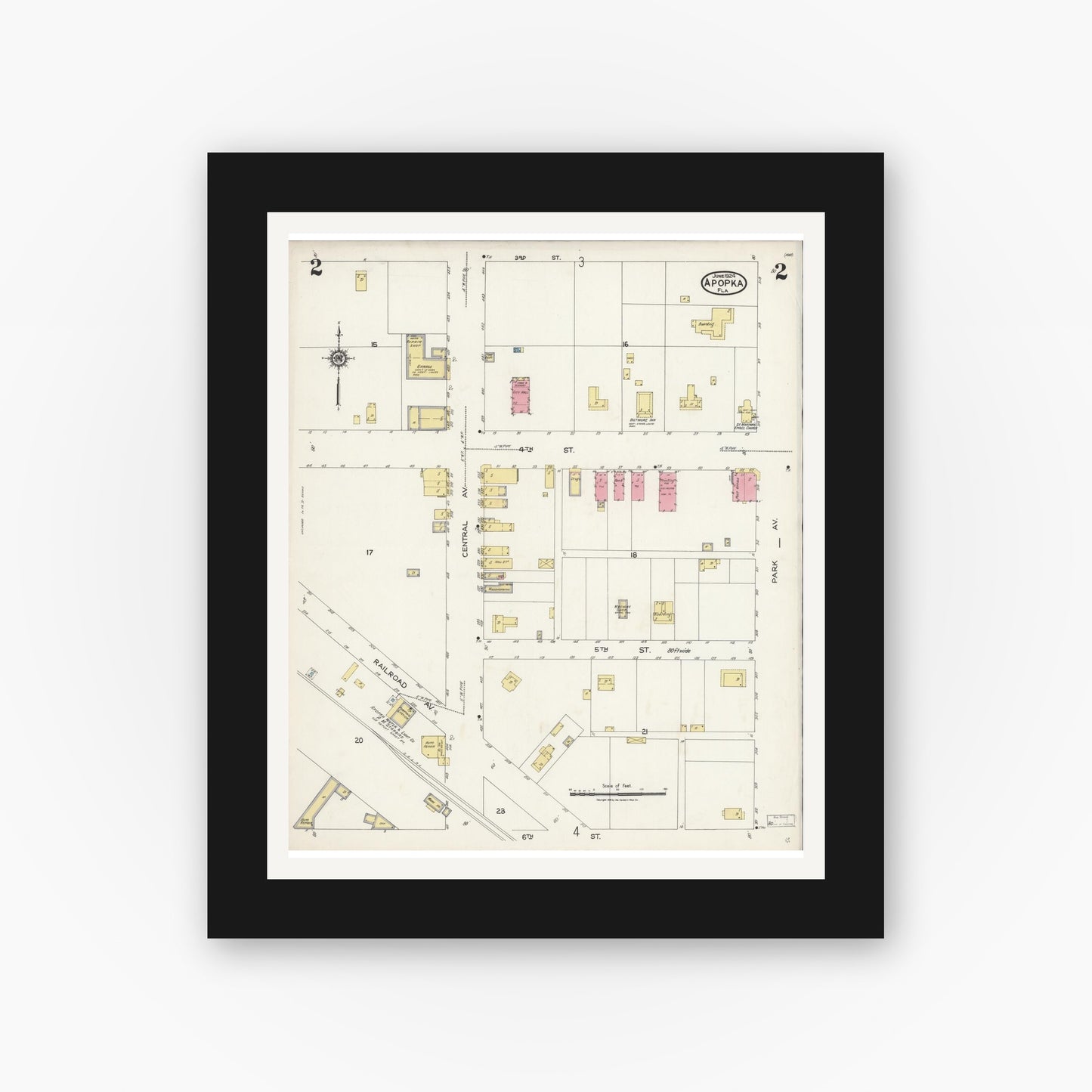 Old map wall art mockup — black gallery frame with white mat — Sanborn Fire Insurance Map from Apopka, Orange County, Florida (1924), Sheet #0002