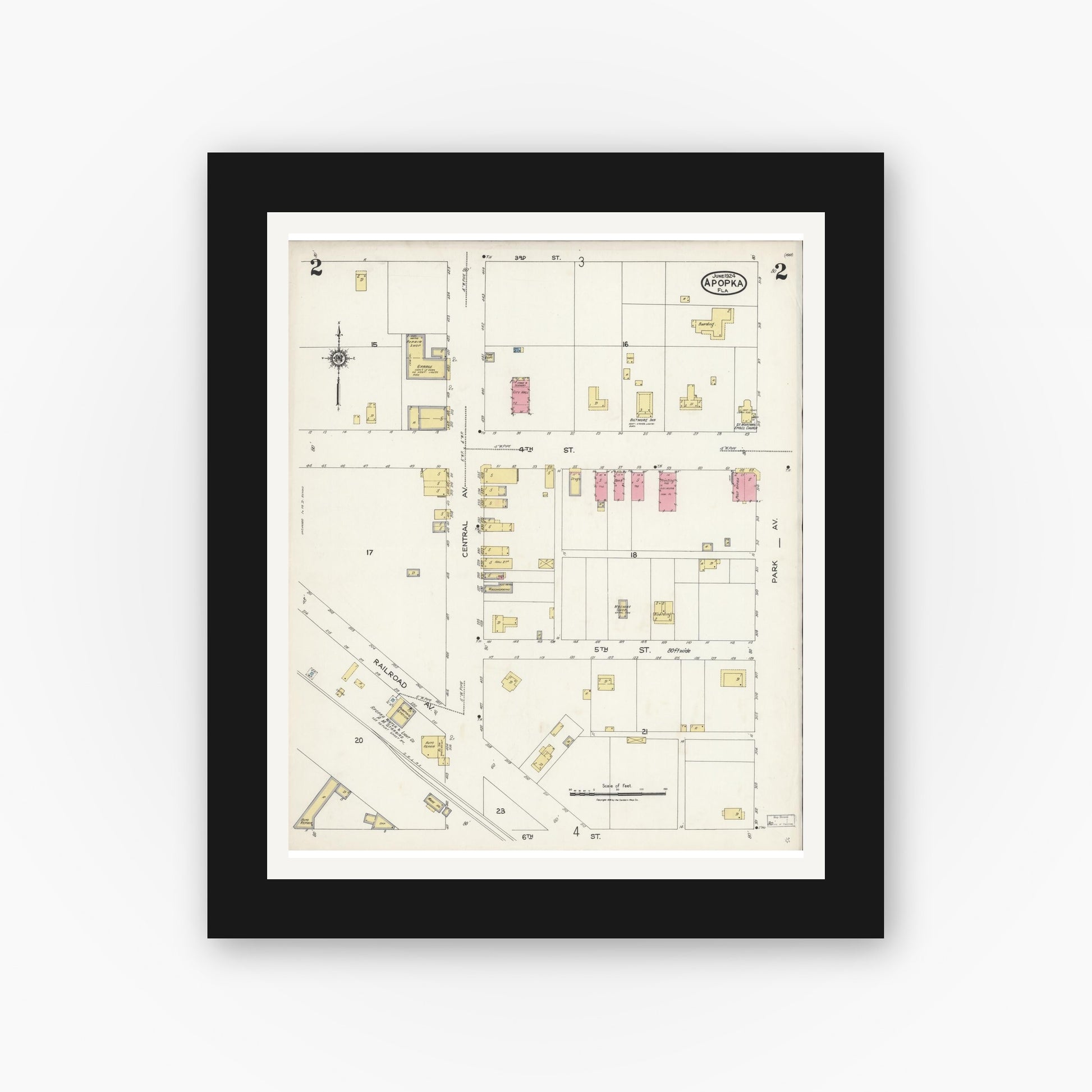 Old map wall art mockup — black gallery frame with white mat — Sanborn Fire Insurance Map from Apopka, Orange County, Florida (1924), Sheet #0002