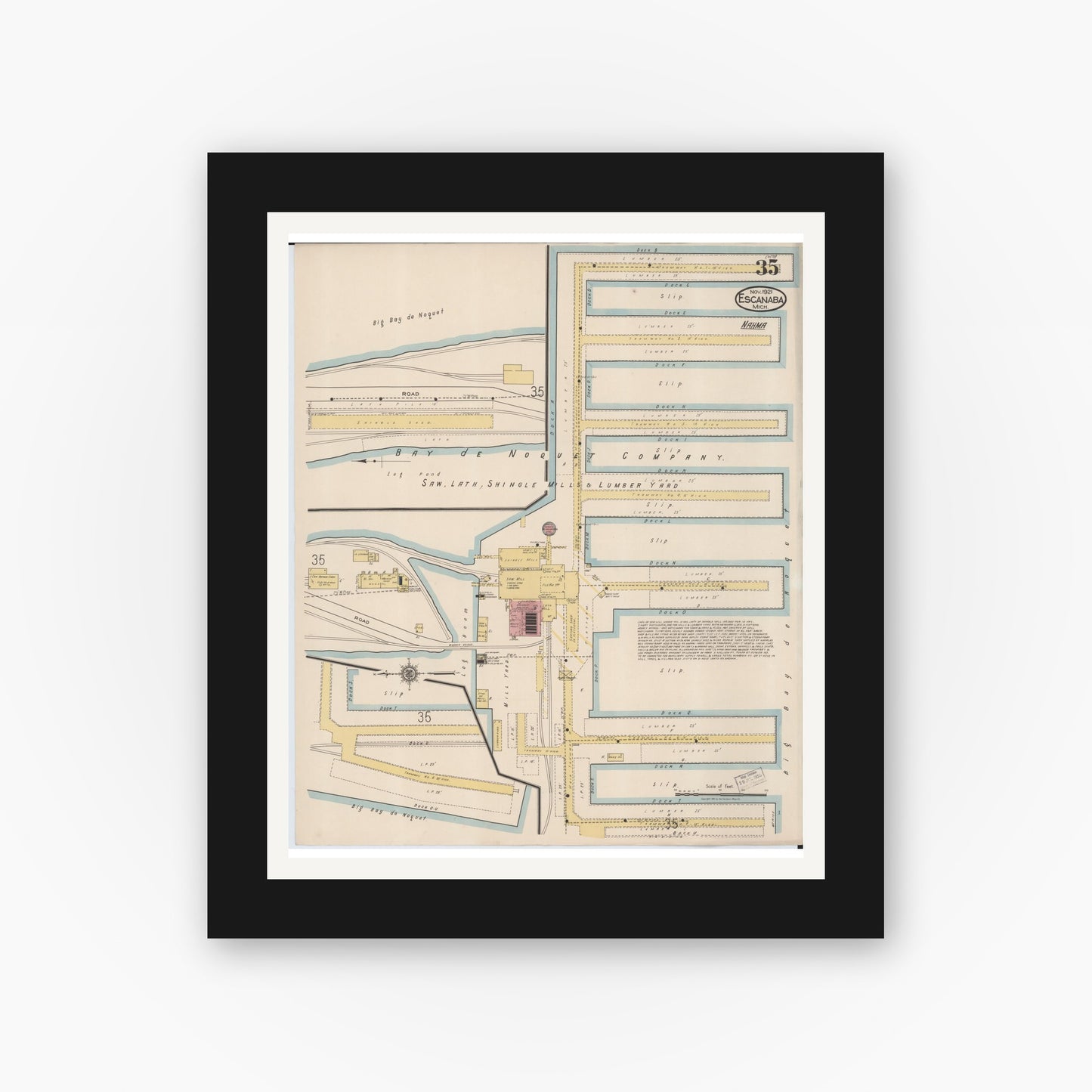 Old map wall art mockup — black gallery frame with white mat — Sanborn Fire Insurance Map from Escanaba, Delta County, Michigan (1921), Sheet #0035