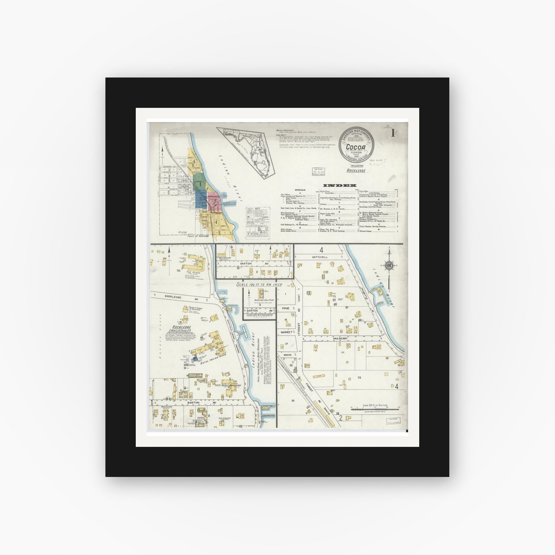 Old map wall art mockup — black gallery frame with white mat — Sanborn Fire Insurance Map from Cocoa, Brevard County, Florida (1919), Sheet #0001