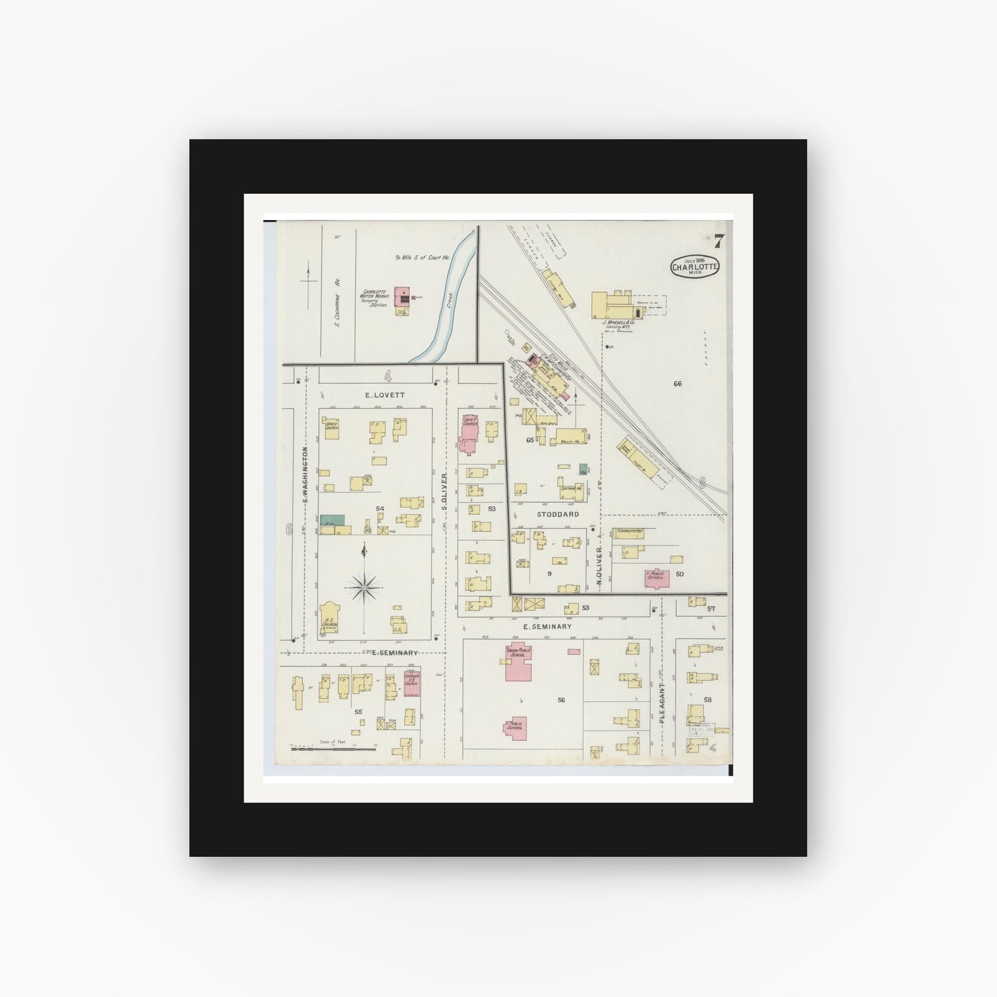 Old map wall art mockup — black gallery frame with white mat — Sanborn Fire Insurance Map from Charlotte, Eaton County, Michigan (1895), Sheet #0007