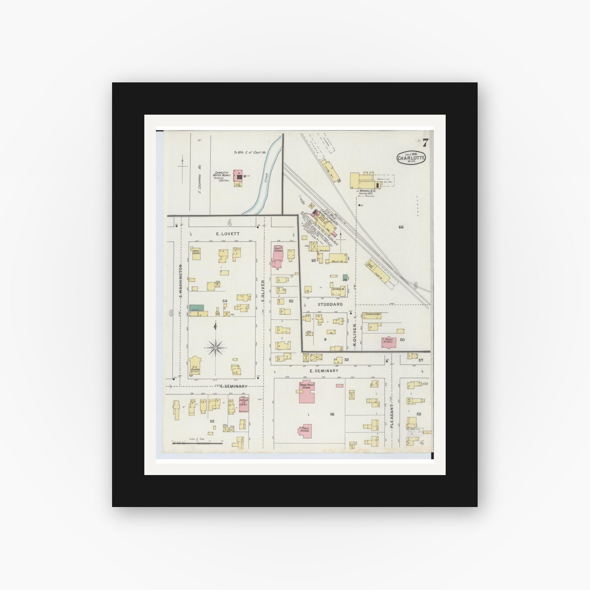 Old map wall art mockup — black gallery frame with white mat — Sanborn Fire Insurance Map from Charlotte, Eaton County, Michigan (1895), Sheet #0007