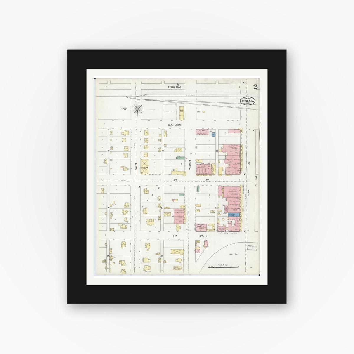 Old map wall art mockup — black gallery frame with white mat — Sanborn Fire Insurance Map from Rich Hill, Bates County, Missouri (1906), Sheet #0002