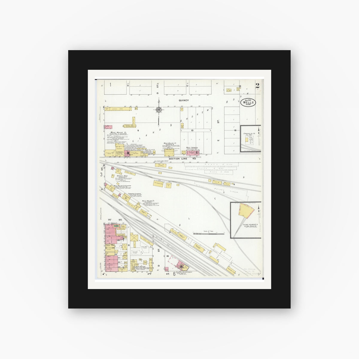 Old map wall art mockup — black gallery frame with white mat — Sanborn Fire Insurance Map from Wells, Faribault County, Minnesota (1909), Sheet #0002