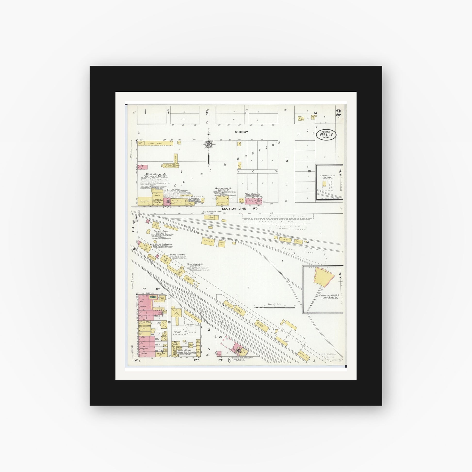 Old map wall art mockup — black gallery frame with white mat — Sanborn Fire Insurance Map from Wells, Faribault County, Minnesota (1909), Sheet #0002