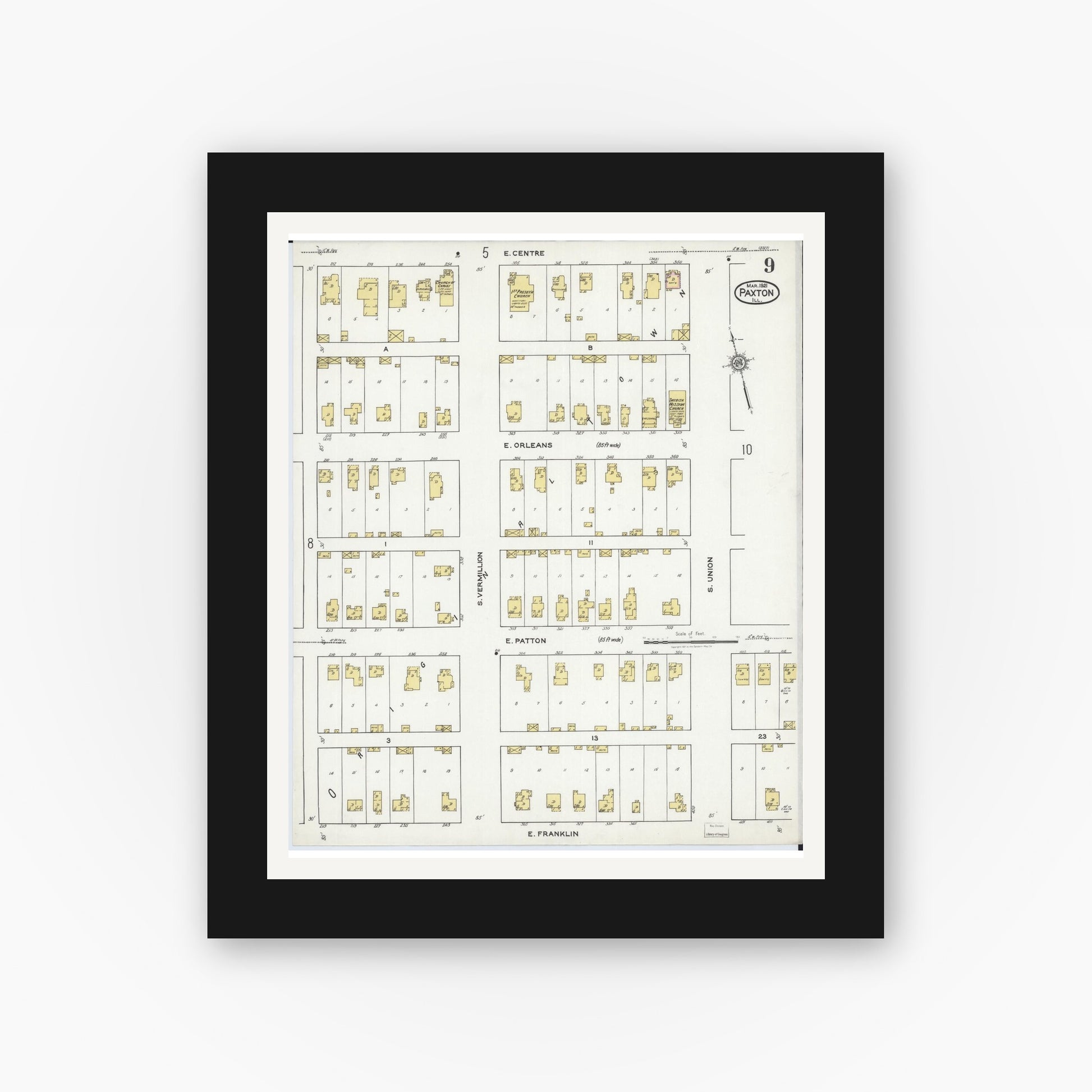 Old map wall art mockup — black gallery frame with white mat — Sanborn Fire Insurance Map from Paxton, Ford County, Illinois (1921), Sheet #0009