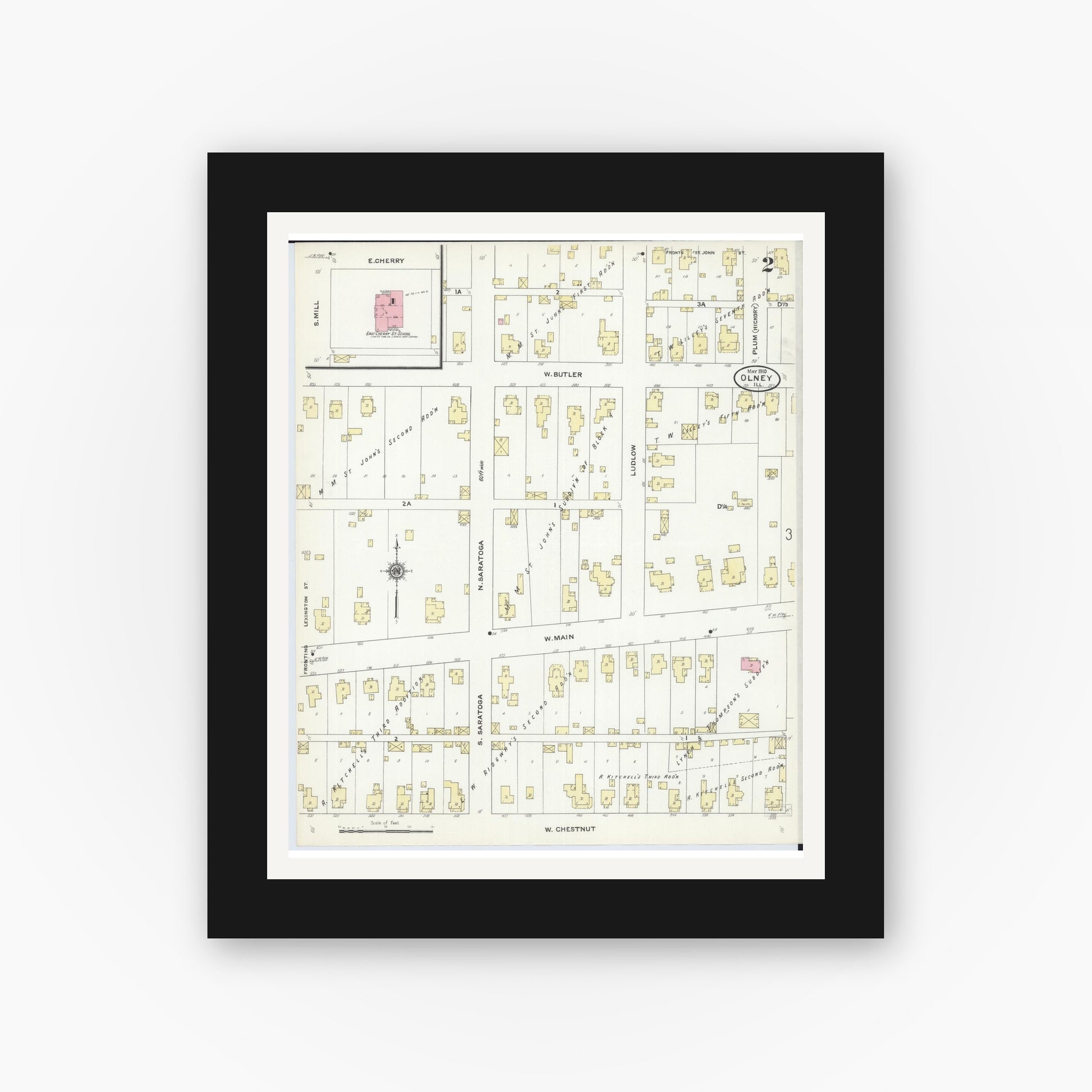 Old map wall art mockup — black gallery frame with white mat — Sanborn Fire Insurance Map from Olney, Richland County, Illinois (1910), Sheet #0002