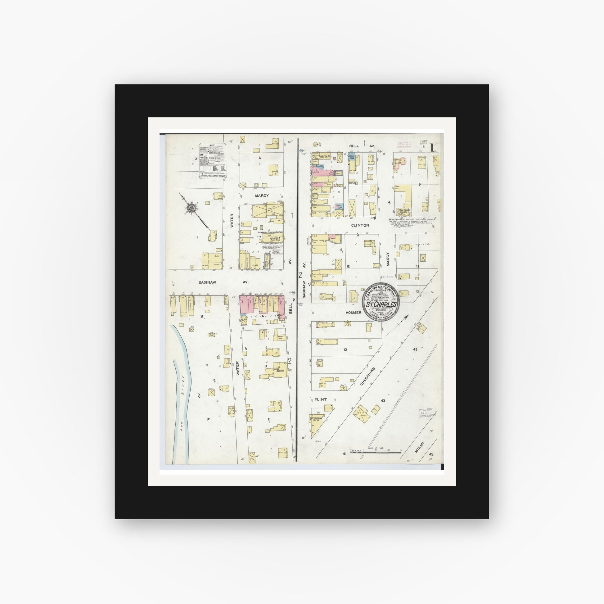 Old map wall art mockup — black gallery frame with white mat — Sanborn Fire Insurance Map from Saint Charles, Saginaw County, Michigan (1910) - Complete Map Set