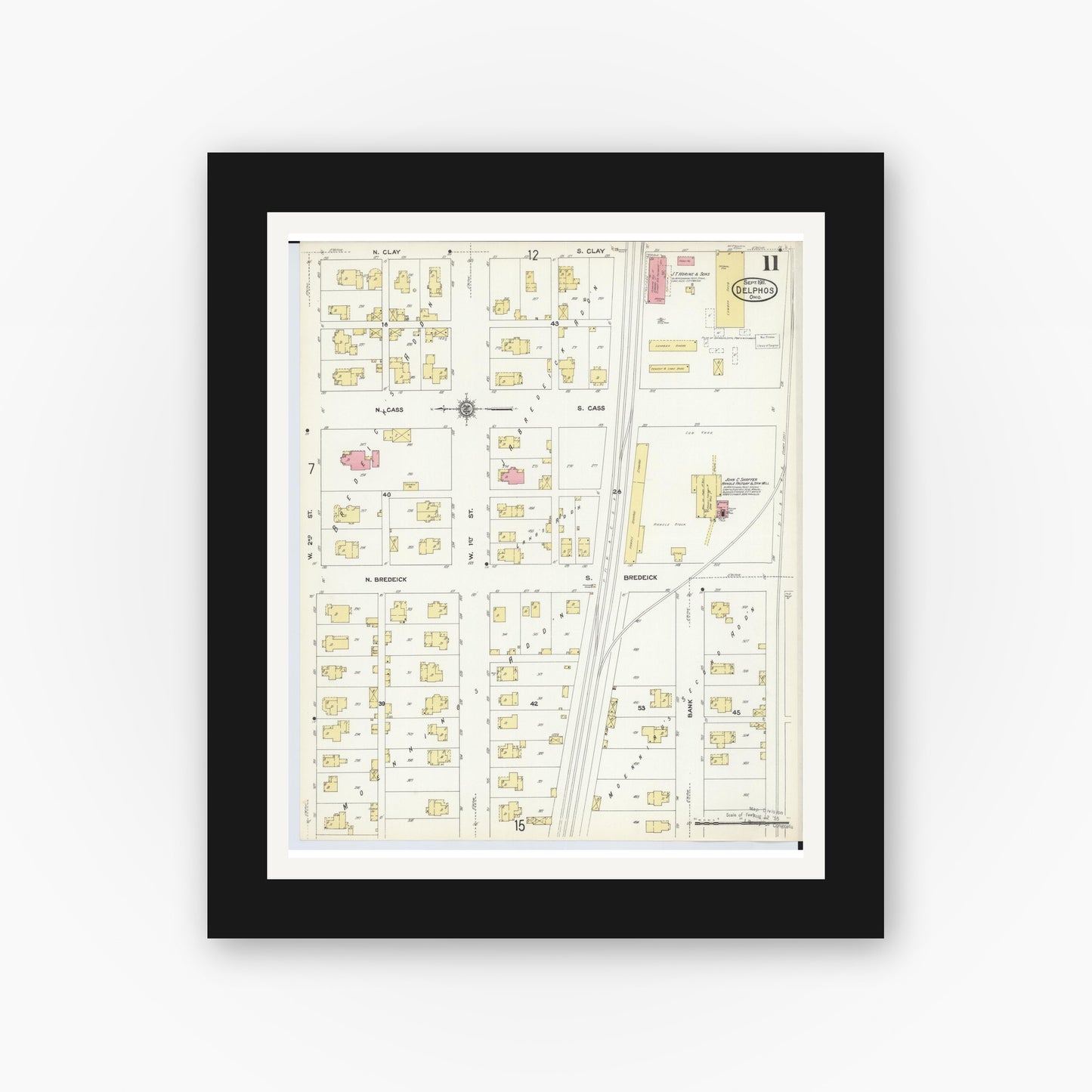 Old map wall art mockup — black gallery frame with white mat — Sanborn Fire Insurance Map from Delphos, Van Wert And Allen Counties, Ohio (1911), Sheet #0011