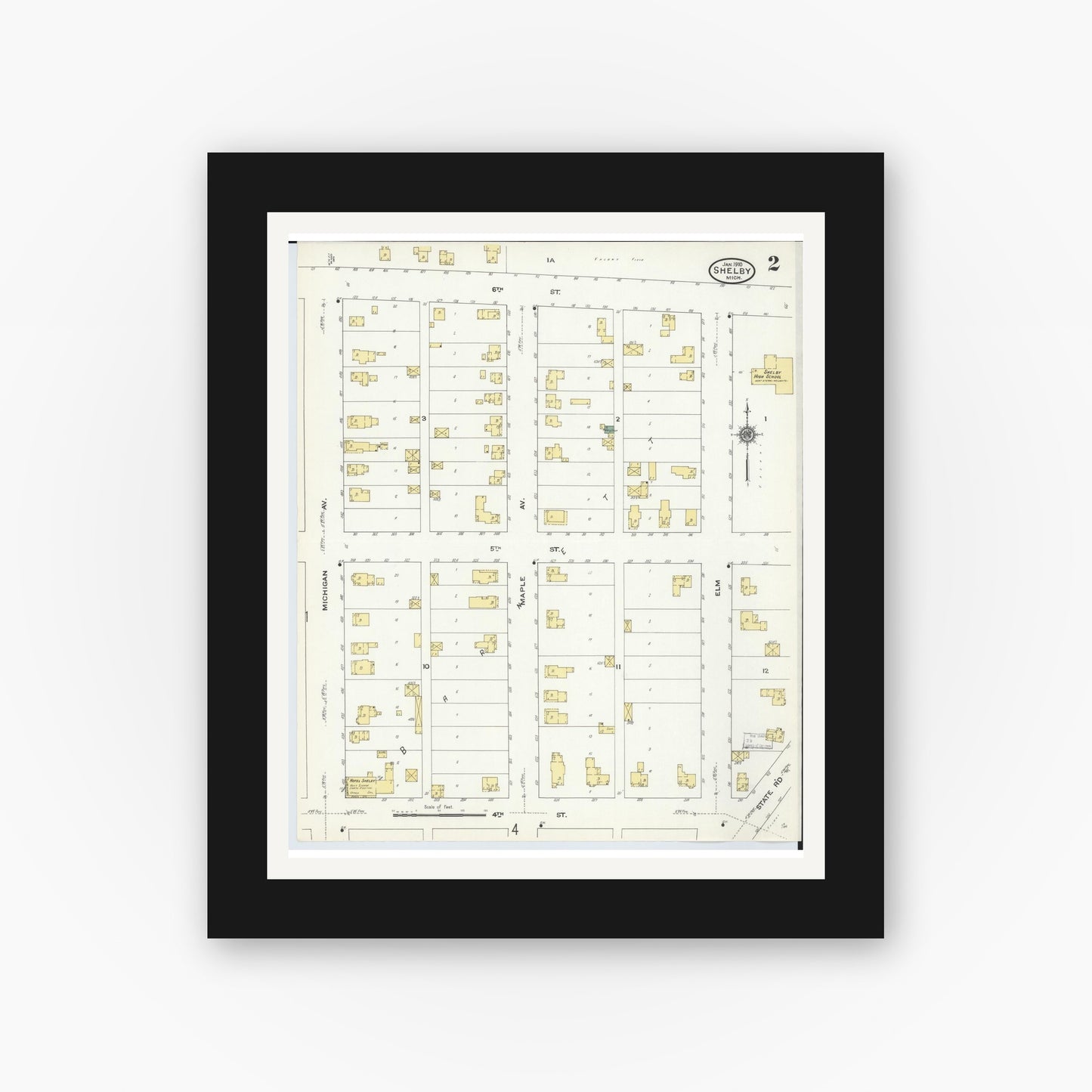 Old map wall art mockup — black gallery frame with white mat — Sanborn Fire Insurance Map from Shelby, Oceana County, Michigan (1910), Sheet #0002