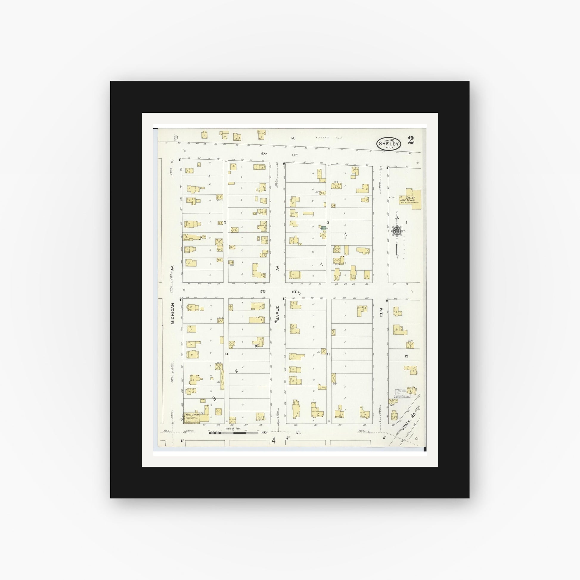 Old map wall art mockup — black gallery frame with white mat — Sanborn Fire Insurance Map from Shelby, Oceana County, Michigan (1910), Sheet #0002