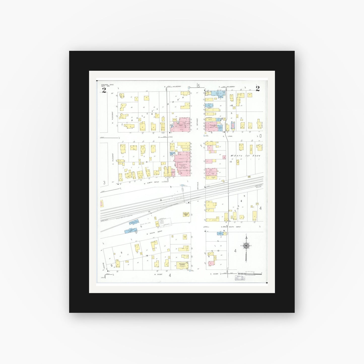 Old map wall art mockup — black gallery frame with white mat — Sanborn Fire Insurance Map from Stryker, Williams County, Ohio (1951), Sheet #0002