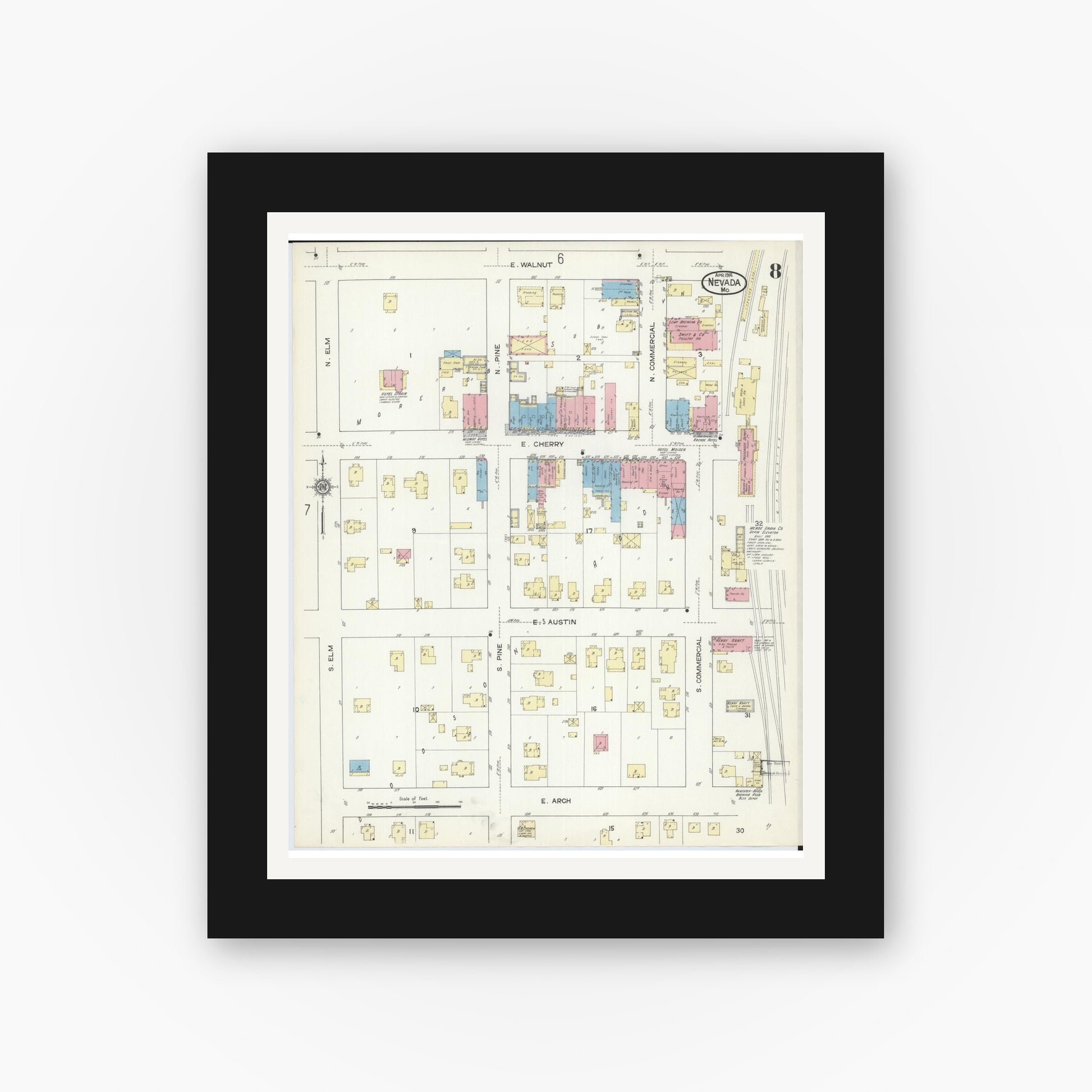 Old map wall art mockup — black gallery frame with white mat — Sanborn Fire Insurance Map from Nevada, Vernon County, Missouri (1914), Sheet #0008