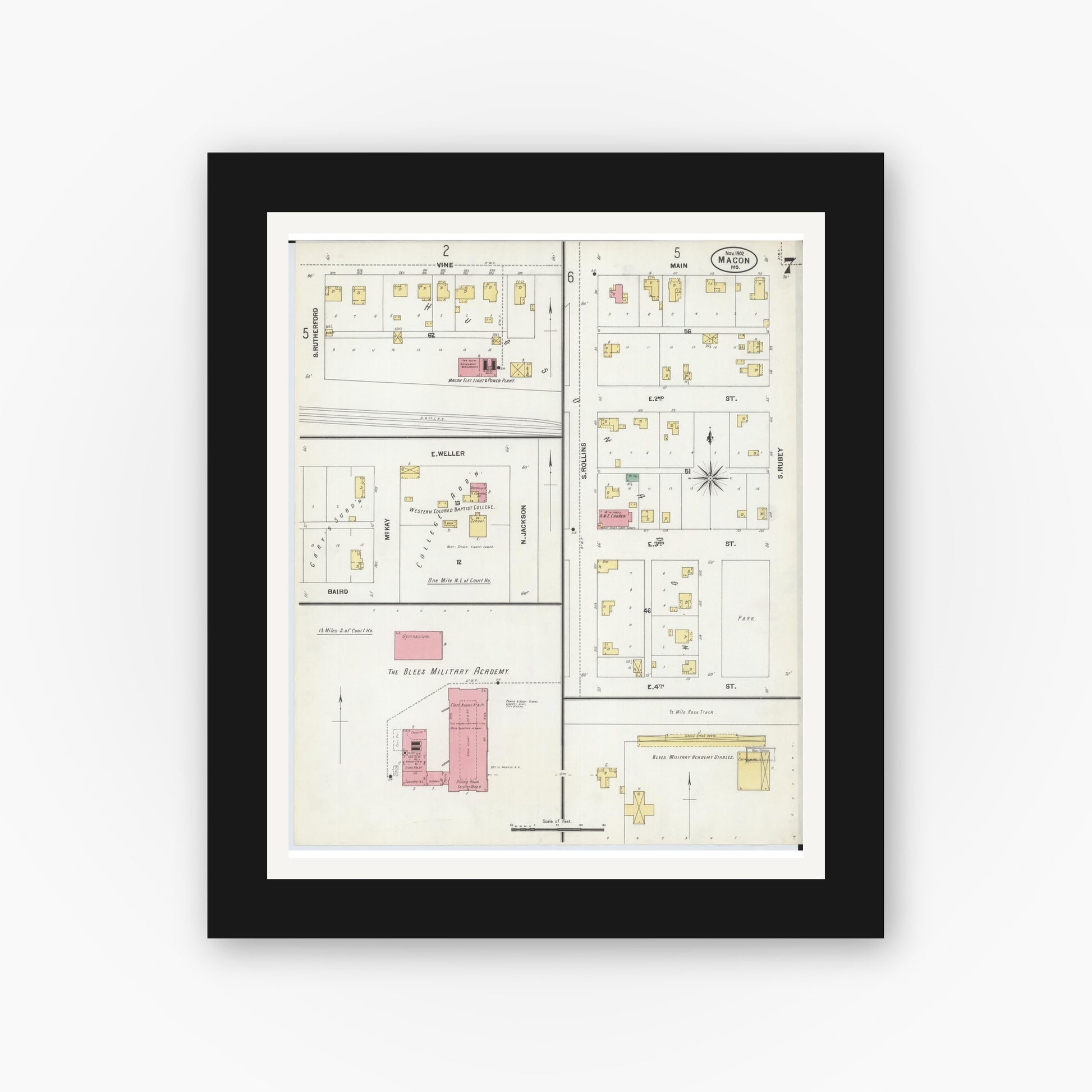 Old map wall art mockup — black gallery frame with white mat — Sanborn Fire Insurance Map from Macon, Macon County, Missouri (1902), Sheet #0007