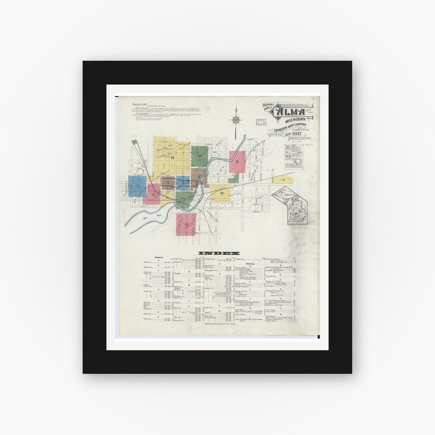Old map wall art mockup — black gallery frame with white mat — Sanborn Fire Insurance Map from Alma, Gratiot County, Michigan (1917), Sheet #0001