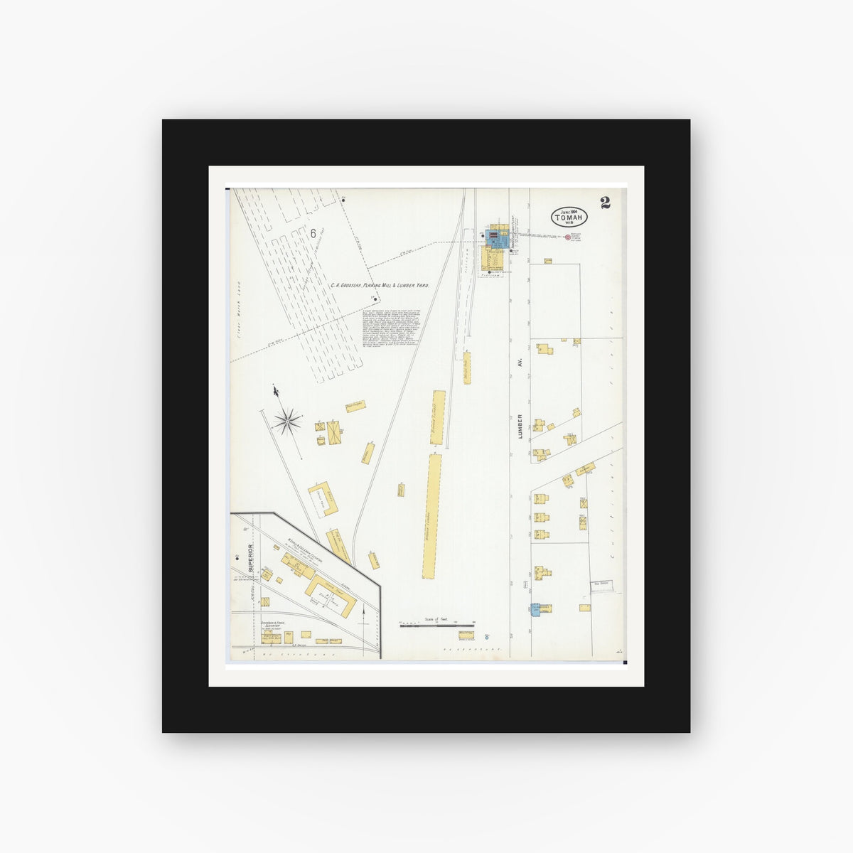 Old map wall art mockup — black gallery frame with white mat — Sanborn Fire Insurance Map from Tomah, Monroe County, Wisconsin (1904), Sheet #0002