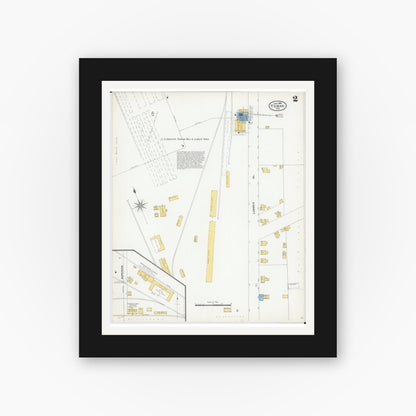 Old map wall art mockup — black gallery frame with white mat — Sanborn Fire Insurance Map from Tomah, Monroe County, Wisconsin (1904), Sheet #0002
