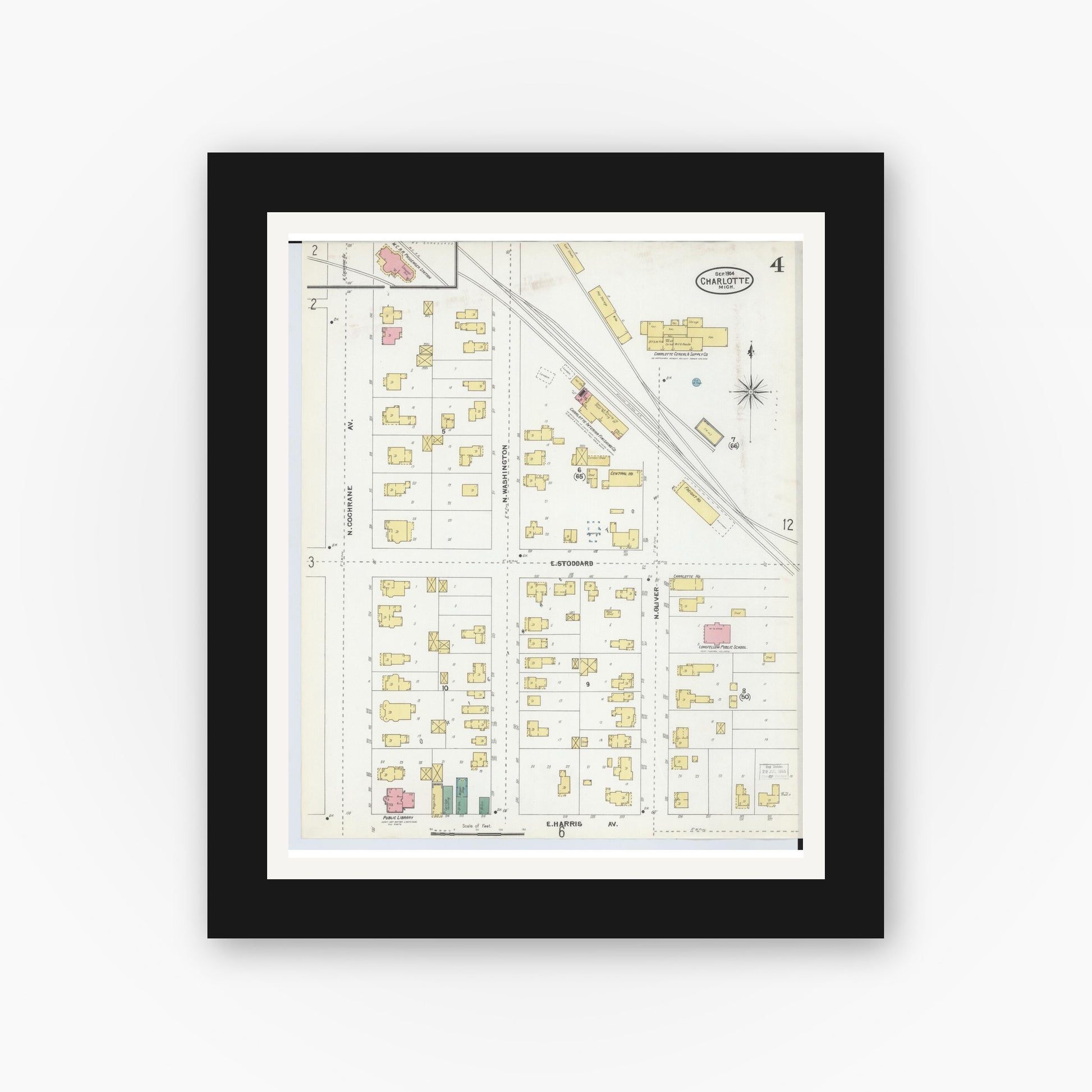 Old map wall art mockup — black gallery frame with white mat — Sanborn Fire Insurance Map from Charlotte, Eaton County, Michigan (1904), Sheet #0004